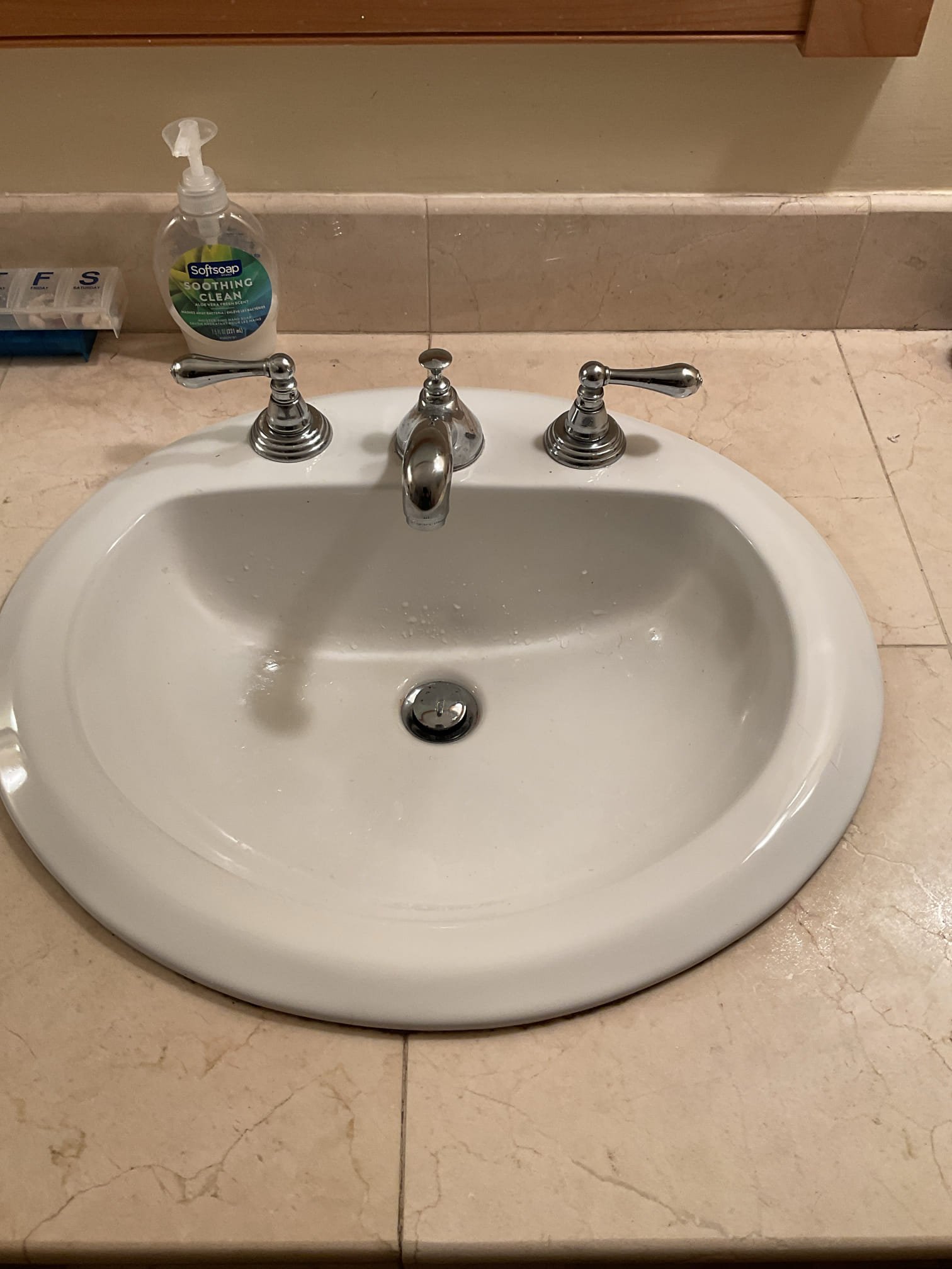 Upon arrival, the homeowner reported concerns with an intermittently flushing toilet previously repaired under warranty, insufficient hot water at the upstairs shower, and a leak from the cold-side cartridge of the upstairs bathroom lavatory faucet. We adjusted the basement toilet and tested it repeatedly, confirming consistent and proper flushing operation. For the upstairs shower, we disassembled the trim and adjusted the temperature limiter to allow for a higher temperature range; the shower was run for 10 minutes with no fluctuation, verifying correct performance.

We confirmed that the cold-side lavatory faucet cartridge was leaking from the top of the valve stem. The hot-side cartridge had been replaced during the prior visit, and we have now replaced the cold side as well to eliminate the leak and restore full functionality. The faucet was tested and is operating properly with no leaks present at this time.