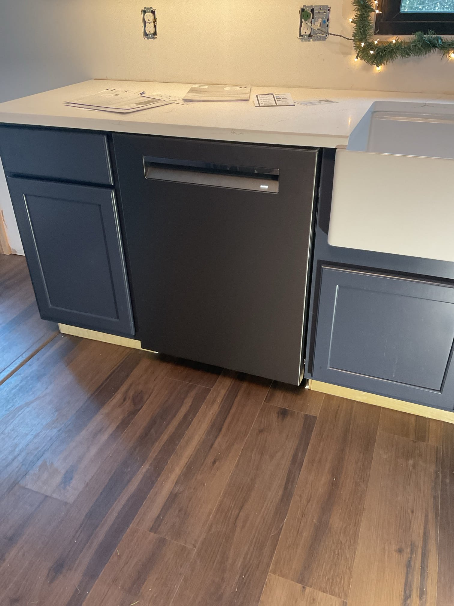 The dishwasher and first-floor lavatory required installation and connection to the existing plumbing system. We installed both fixtures with proper water supply, drainage, and venting to ensure reliable operation and improved functionality in the kitchen and bathroom.

For the lavatory, we enlarged cabinet openings as needed to accommodate the drain line, set and leveled the cabinet, and secured it to the wall. New drainage was installed through the cabinet with a 1-1/4” outlet for the sink drain, along with an air admittance valve to maintain proper pressure balance. The customer-supplied faucet and pop-up assembly were installed using plumber’s putty and thread sealant, and supply lines were connected to hot and cold water. The faucet was tested for proper operation with no leaks observed.

An ice maker supply line was installed for the refrigerator. The unit was pulled from the cabinet, a 120” braided stainless steel supply line was connected, and the water was turned on and tested