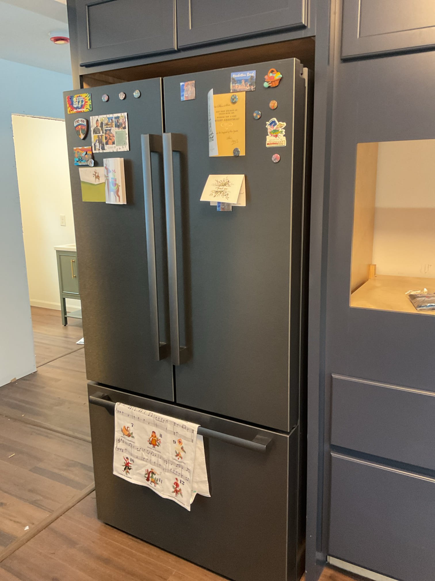 The dishwasher and first-floor lavatory required installation and connection to the existing plumbing system. We installed both fixtures with proper water supply, drainage, and venting to ensure reliable operation and improved functionality in the kitchen and bathroom.

For the lavatory, we enlarged cabinet openings as needed to accommodate the drain line, set and leveled the cabinet, and secured it to the wall. New drainage was installed through the cabinet with a 1-1/4” outlet for the sink drain, along with an air admittance valve to maintain proper pressure balance. The customer-supplied faucet and pop-up assembly were installed using plumber’s putty and thread sealant, and supply lines were connected to hot and cold water. The faucet was tested for proper operation with no leaks observed.

An ice maker supply line was installed for the refrigerator. The unit was pulled from the cabinet, a 120” braided stainless steel supply line was connected, and the water was turned on and tested