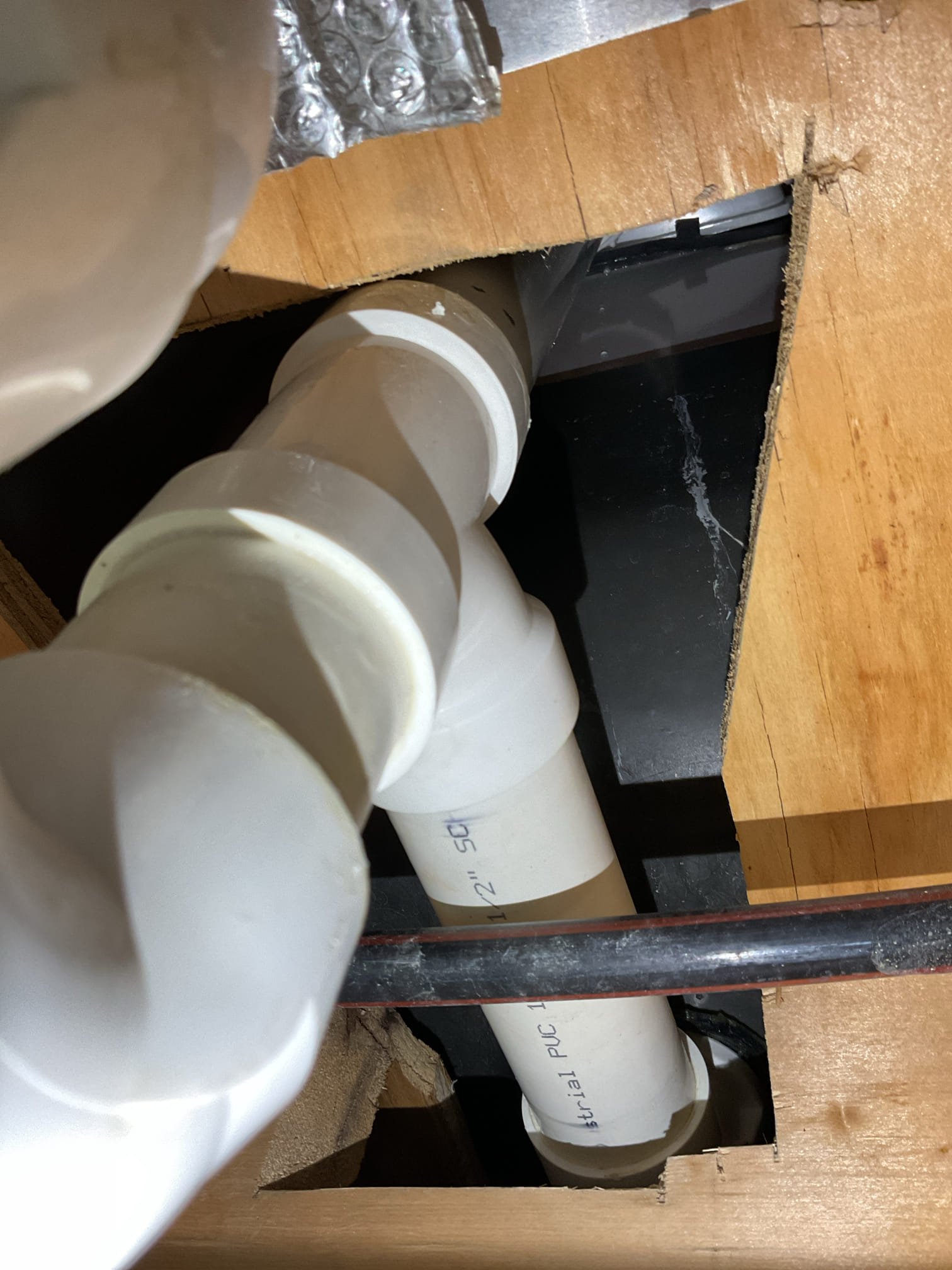 Returned to investigate a recurring leak. As shown briefly in the provided video, we performed a detailed water test on the waste and overflow as well as each fixture individually to isolate the source of the leak. We also tested the grout line where the tub meets the tile and thoroughly sprayed all shower walls. The only area that resulted in a leak was the waste and overflow assembly.

To resolve the issue without replacing the entire assembly, we will replace the gasket, bracket, and head piece through the rear access we will cut. This repair will renew all components responsible for maintaining the watertight seal.  Parts are on order and estimated arrival next week
