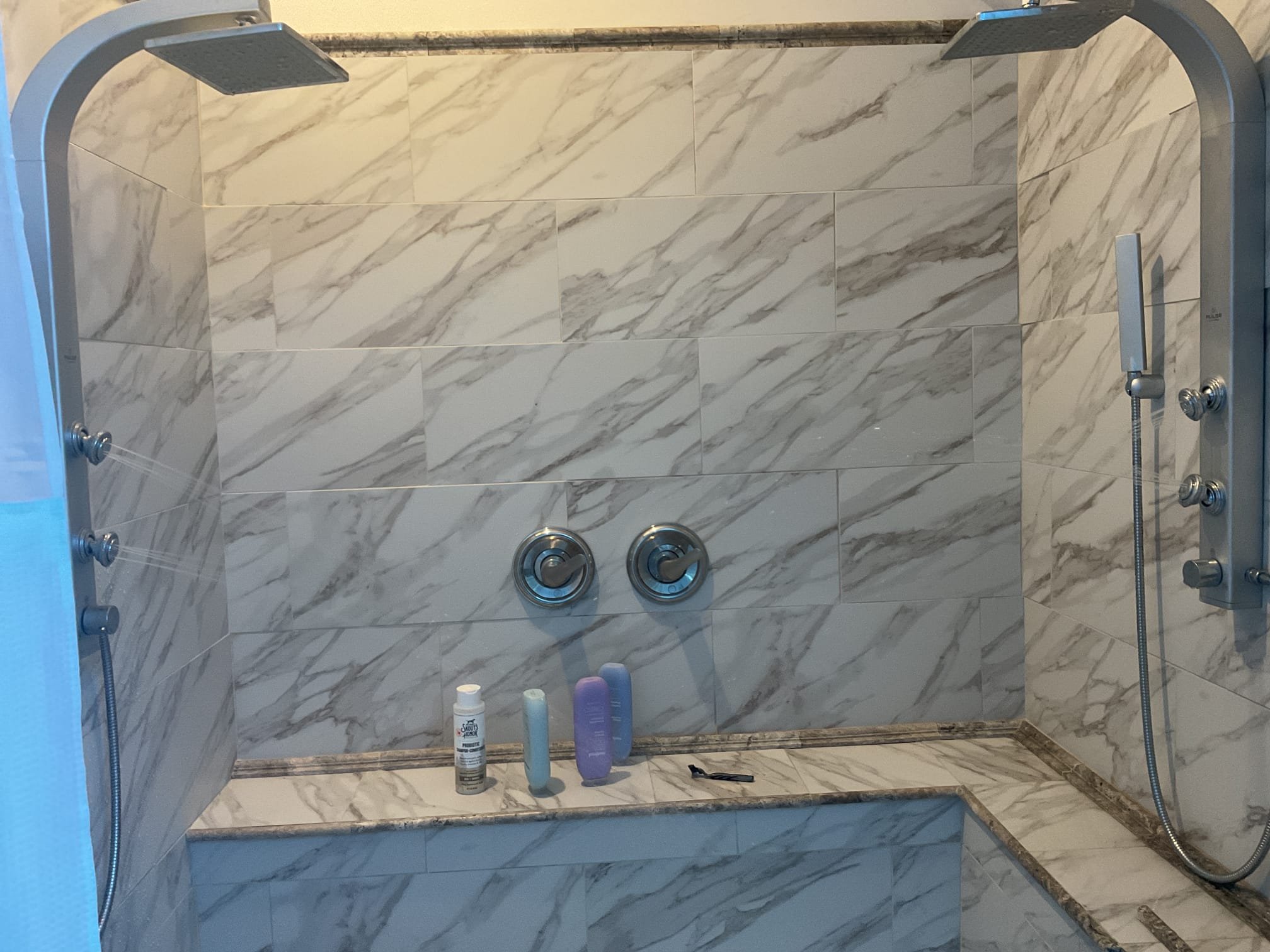 Upon arrival of we tested the ,aster bathroom shower tomorrow test if it was turning on. Homeowner reported it didn’t turn on this morning. When we tested the shower it worked as it should. Both shower valves and bother shower systems shower head, body sprayer, and side sprayer worked appropriately. Temperature adjustment worked as it should as well. We took apart the handle and tighten everything associated with it re assembled and tested it again. Everything is operating as intended at this time. 