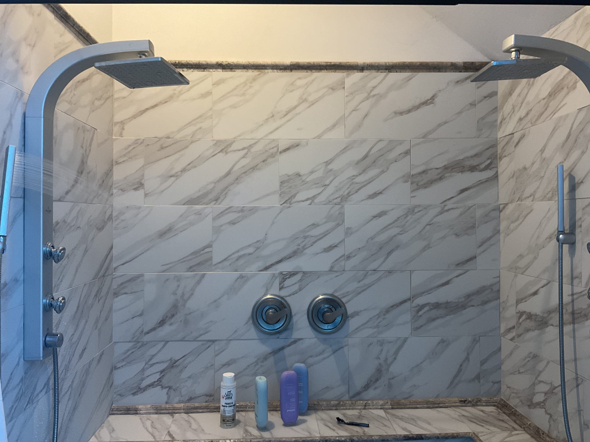 Upon arrival of we tested the ,aster bathroom shower tomorrow test if it was turning on. Homeowner reported it didn’t turn on this morning. When we tested the shower it worked as it should. Both shower valves and bother shower systems shower head, body sprayer, and side sprayer worked appropriately. Temperature adjustment worked as it should as well. We took apart the handle and tighten everything associated with it re assembled and tested it again. Everything is operating as intended at this time. 