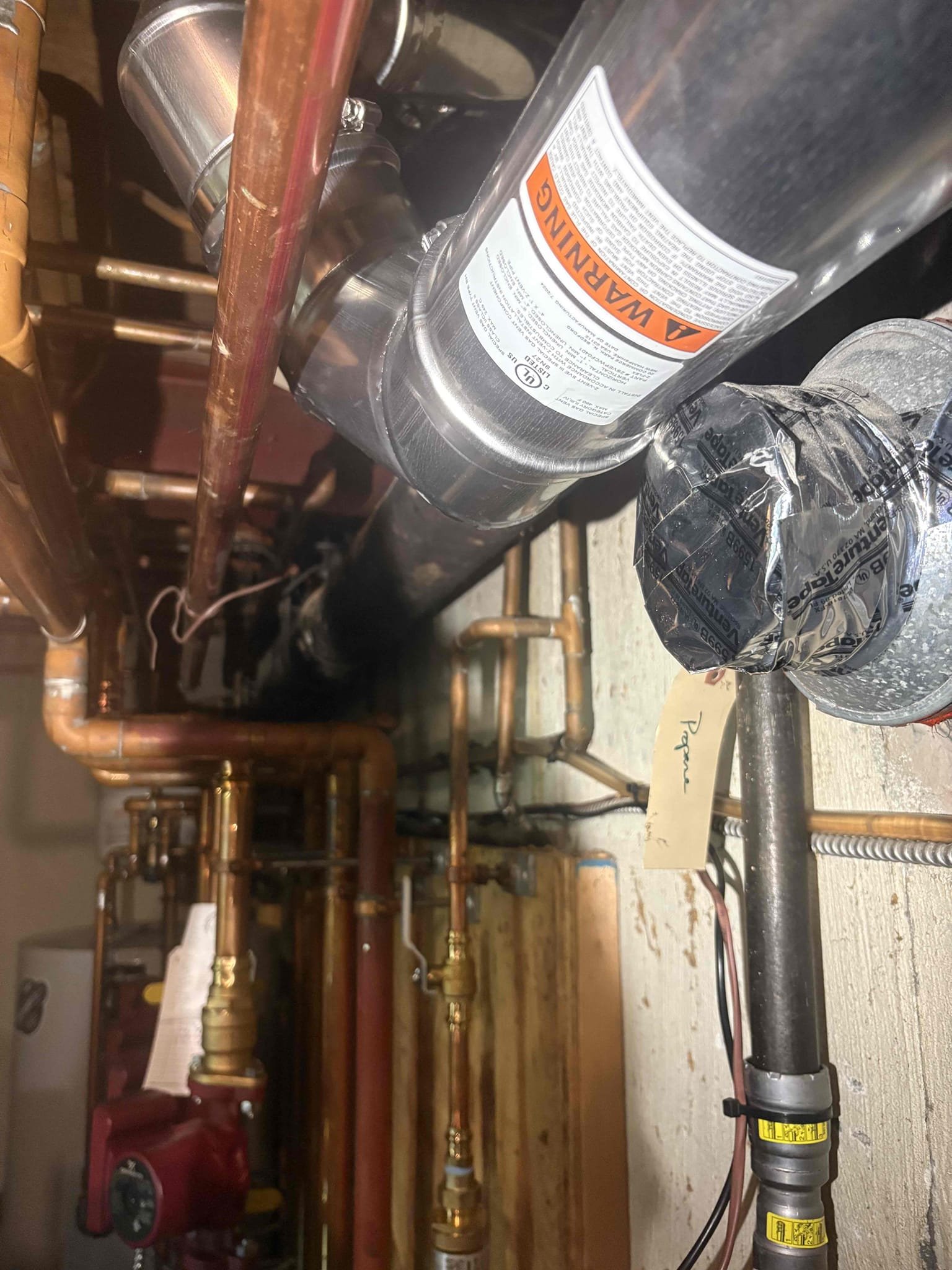 Arrived on site for a reported boiler leak and an unresponsive upstairs thermostat.

Upon inspection, the source of the leak was identified as the boiler vent piping. The existing venting was removed and replaced with new Z-Vent piping from the boiler discharge to the vertical connection in the garage. All vent connections were properly sealed, and correct pitch was verified throughout. At this time, no leaks are present.

Further troubleshooting revealed the thermostat wiring between the relay board and the upstairs thermostat had no continuity. The thermostat wire was traced and found to be spliced to another wire. The splice was repaired, restoring proper continuity between the relay board and the upstairs thermostat.

During testing, a delay was observed between the thermostat opening and closing the call for heat. This was discussed with Ziggy, and he was advised to monitor the thermostat for any additional signs of failure.

The system is currently operating properly.
