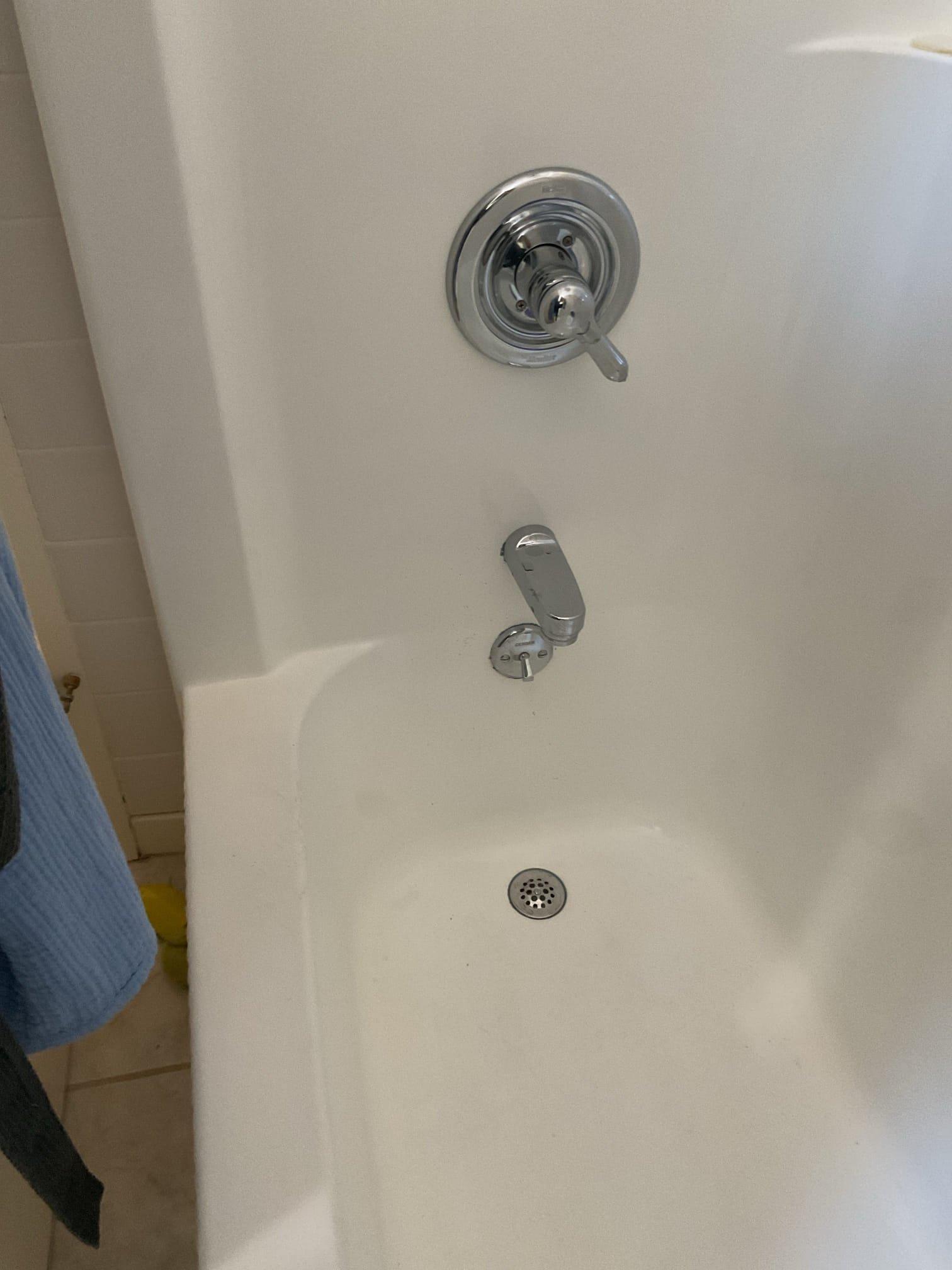 For this job, we replaced the tub waste and overflow assembly due to a cracked and broken retaining nut and the age of the existing components. The old assembly was removed and a new, properly fitted unit was installed to ensure secure connections and prevent future leaks. Upon completion of the replacement, we found that the tub was draining very slowly and recommended snaking the drain to clear a suspected blockage. The drain was snaked, and the blockage was successfully cleared, which was caused by a buildup of hair in the tub drain. The tub was then tested, confirming proper drainage and normal operation in accordance with current plumbing standards.