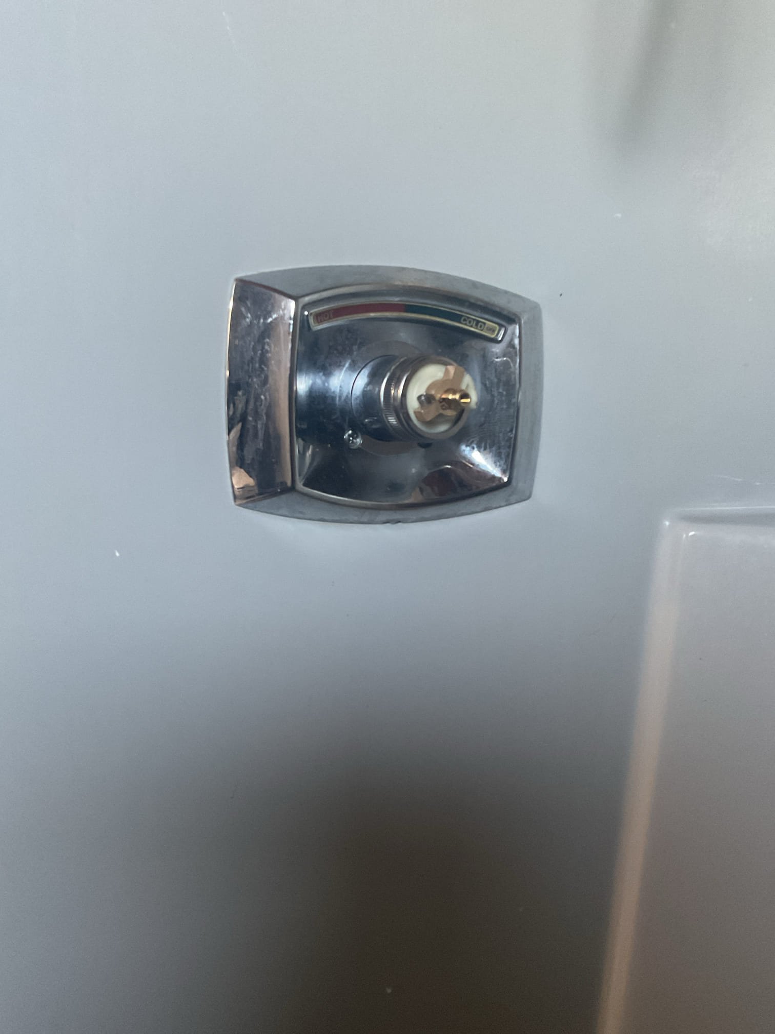 We found the tub/shower valve was leaking due to a worn internal cartridge and related components. Replacement of the Delta cartridge along with new seats and springs was recommended to stop the leak and restore reliable operation.

The water was shut off to the home, the system was drained, and the existing cartridge was removed. During removal, it was determined the valve was a Delta 1600 series rather than a 1300/1400 series, and the price was adjusted accordingly. Inspection showed the seats and springs were not level due to the valve body being slightly twisted from a previous repair, a known issue with this valve design. While there were no active leaks from the valve body, this condition was explained to the homeowner as it can cause minor flow restriction.

New seats, springs, and cartridge were installed using appropriate lubricant after thoroughly cleaning all mating surfaces. Water was restored and the valve was tested for proper operation. No leaks were present at this time