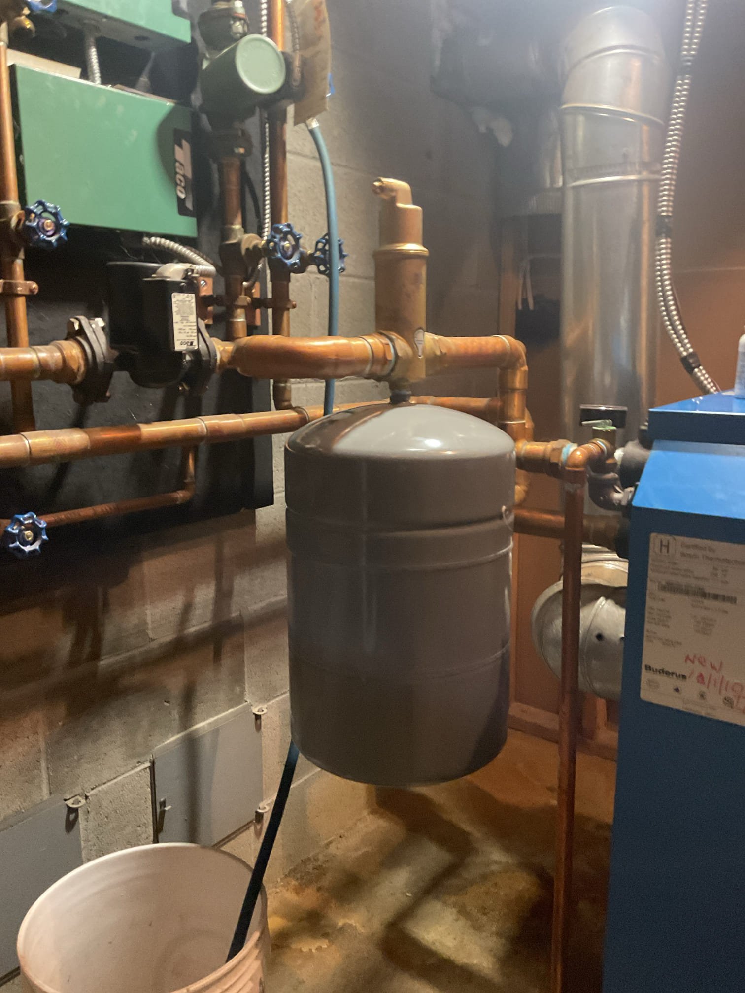 Customer reported that the living room/dining room area would not heat beyond a certain temperature. Upon inspection, the heating loop was found to have little to no circulation and appeared to be air-bound. With customer approval, the affected zone was purged to restore circulation.

During service, it was determined that the system’s air elimination devices were not functioning properly and are in need of replacement. While a significant amount of air was removed, some air remains in the system due to the failed air elimination components.

An estimate will be emailed to the customer to replace the automatic air vents on each zone and the Spirovent Jr. air separator head. Additionally, the Logamatic control was found to be locked in manual mode, limiting the boiler temperature to 140°F. This issue will also be addressed during the return visit when the air elimination devices are replaced. 

Replaced the Spirovent Jr. air separator head on the boiler. Replaced non-functional and heav