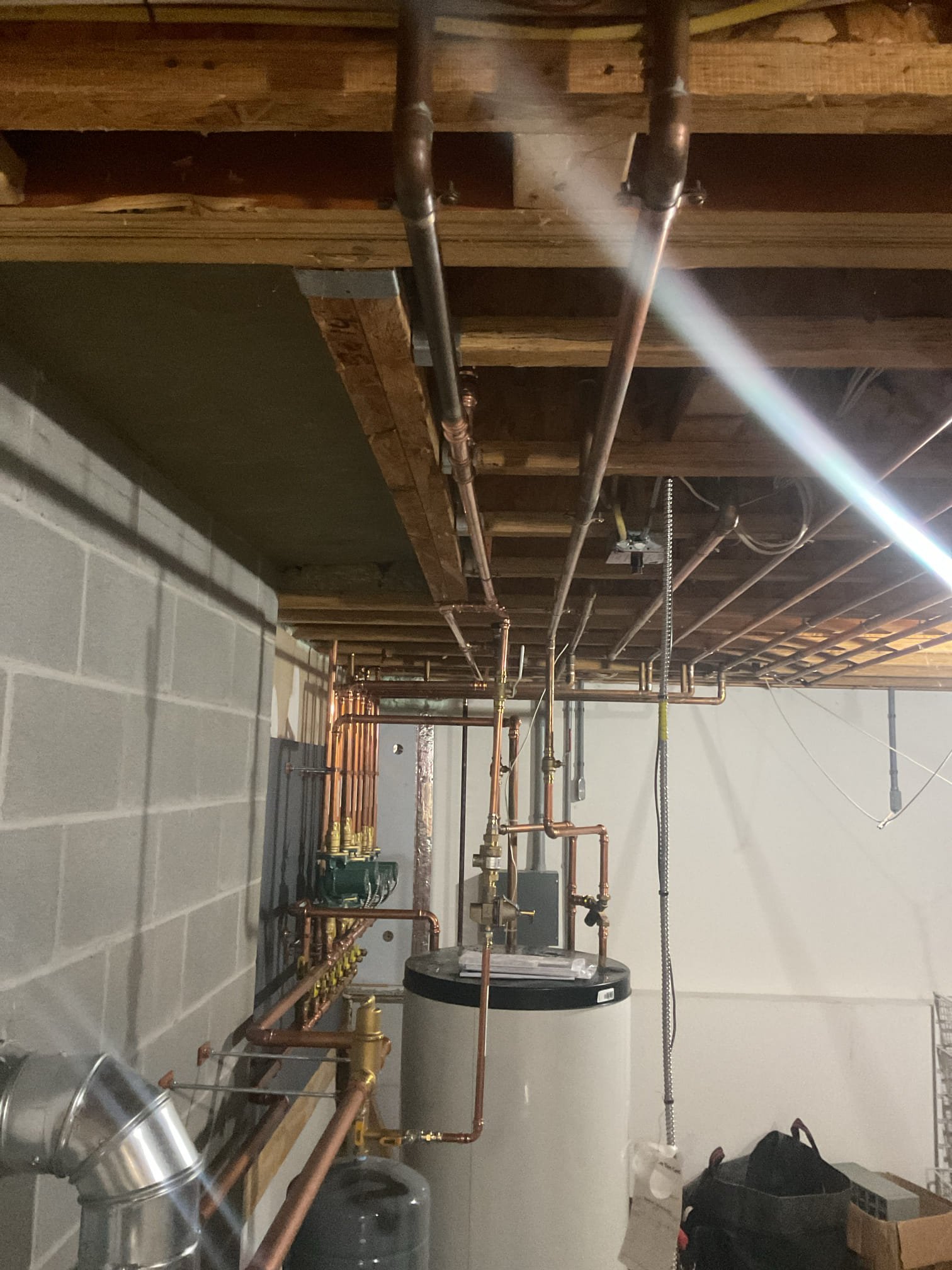 The existing copper water line was cut out and approximately 20 feet of new copper piping was installed in its place. All new piping was properly measured, fitted, and securely soldered to ensure tight, leak-free connections. The water line was carefully reconnected to the existing system and supported with new hangers installed at appropriate intervals to provide proper alignment and long-term stability. Upon completion, the system was pressurized and thoroughly tested to verify proper operation, with no leaks observed and normal water flow restored.