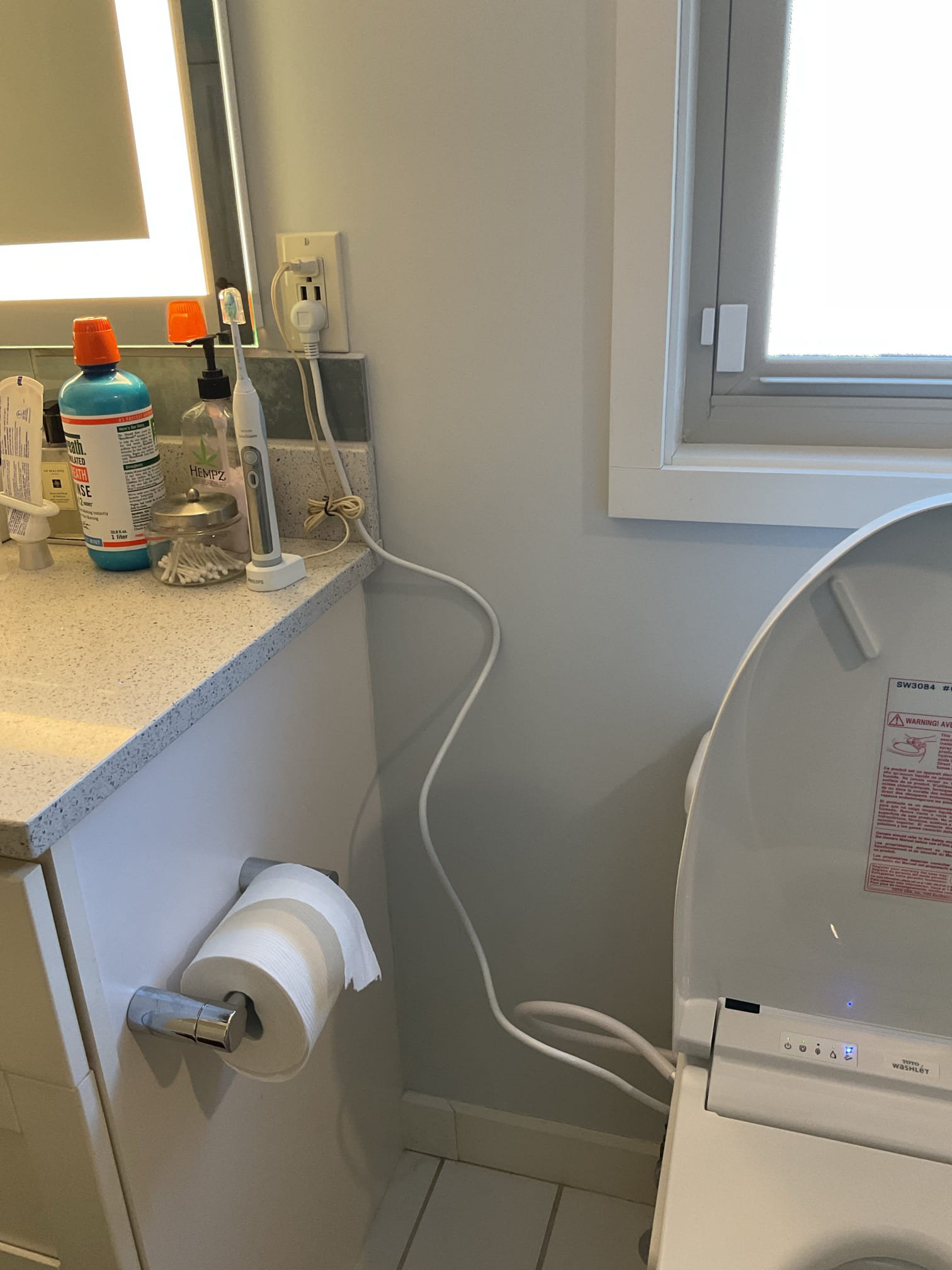 Fastened the existing Moen kitchen faucet to the counter and zip tied the supply lines out of the way to the pull down weight wouldn’t get caught on them. Also removed the Toto toilet seat and installed homeowner supplied Toto washlet bidet toilet seat