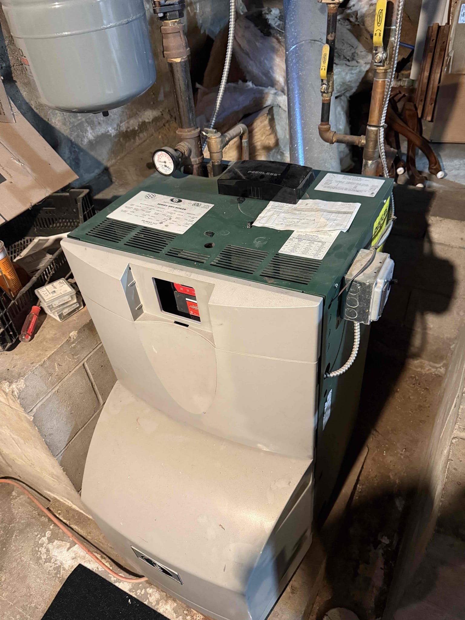 
The customer reported that during basement renovations, several wires may have been damaged, resulting in the boiler not operating properly. Upon inspection, one control wire was found disconnected and no longer leading to the boiler. Using a multimeter, the wire was traced and confirmed to be the thermostat circuit. The wire was reconnected at the boiler, and the affected zone was tested and verified to be operating correctly.

For the additional zone, diagnostics showed that the thermostat was not calling for heat. The customer plans to purchase and install a replacement thermostat, at which time that zone should resume normal operation. At the completion of service, the system was operational and functioning as designed.