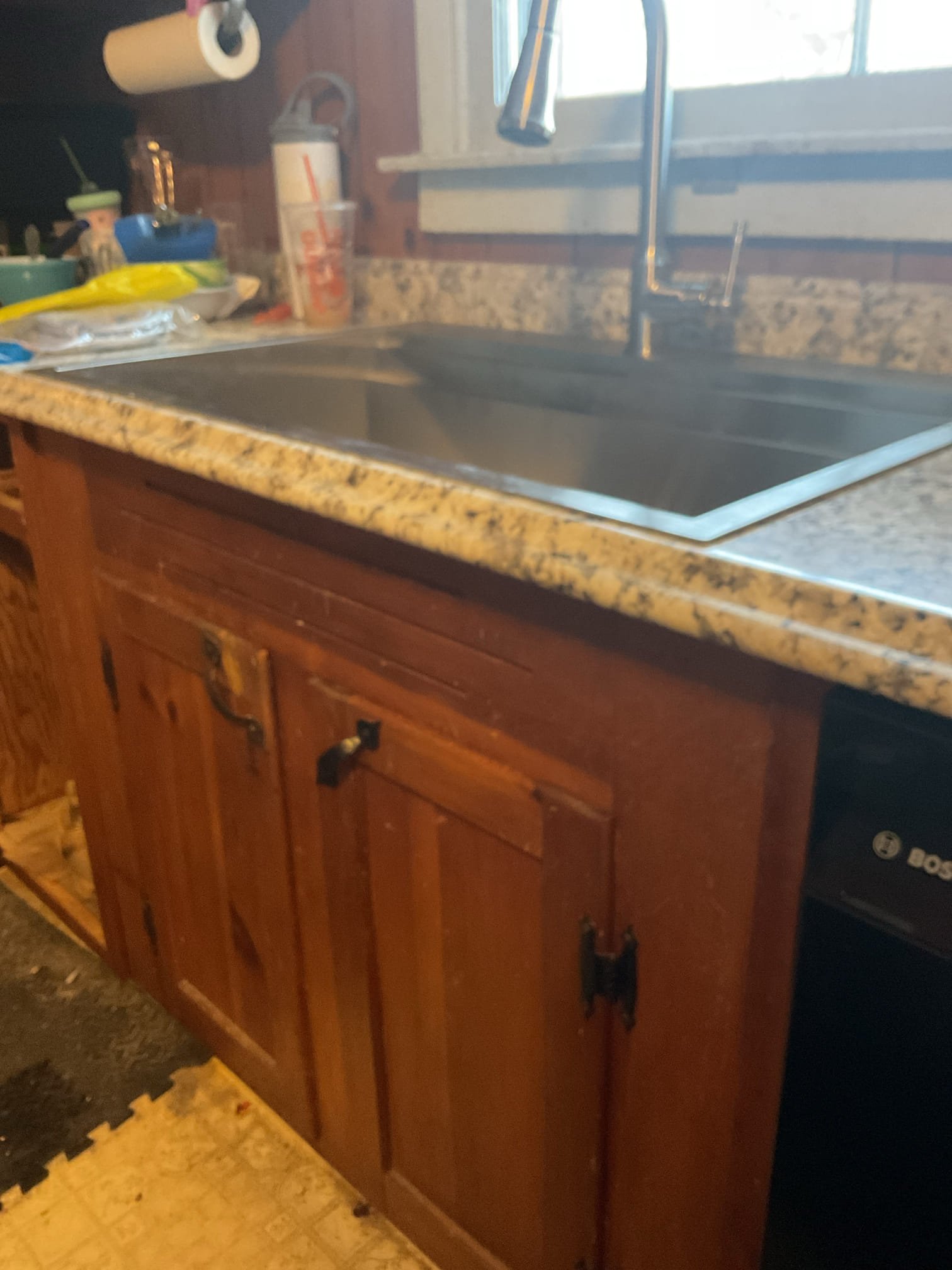 Upon arrival customer had a dishwasher, sink, and a faucet they wanted installed. They also needed to kitchen sink replumbed and needed their kitchen faucet water lines replaced, they needed two leaking gate valves replaced, along with the installation of two dedicated shutoffs for the kitchen faucet. 

I started by removing the sink and old faucet so they could install the new counter top. Once the counter top was installed I ran a new hot water line and new cold water line from the floor and supported them against the wall with bell hangers. I then installed two stop shutoff valves for the faucet and one for the dishwasher supply. I then dropped in the sink with a bead of silicone to seal it. I then installed the basket strainer, a p-trap, and an air admittance valve to give the drain proper ventilation. 

I then installed the dishwasher by connecting it to the wye tailpipe in the sink drain, hooking up to the supply with a braided line, and using the clips to secure it under the cou