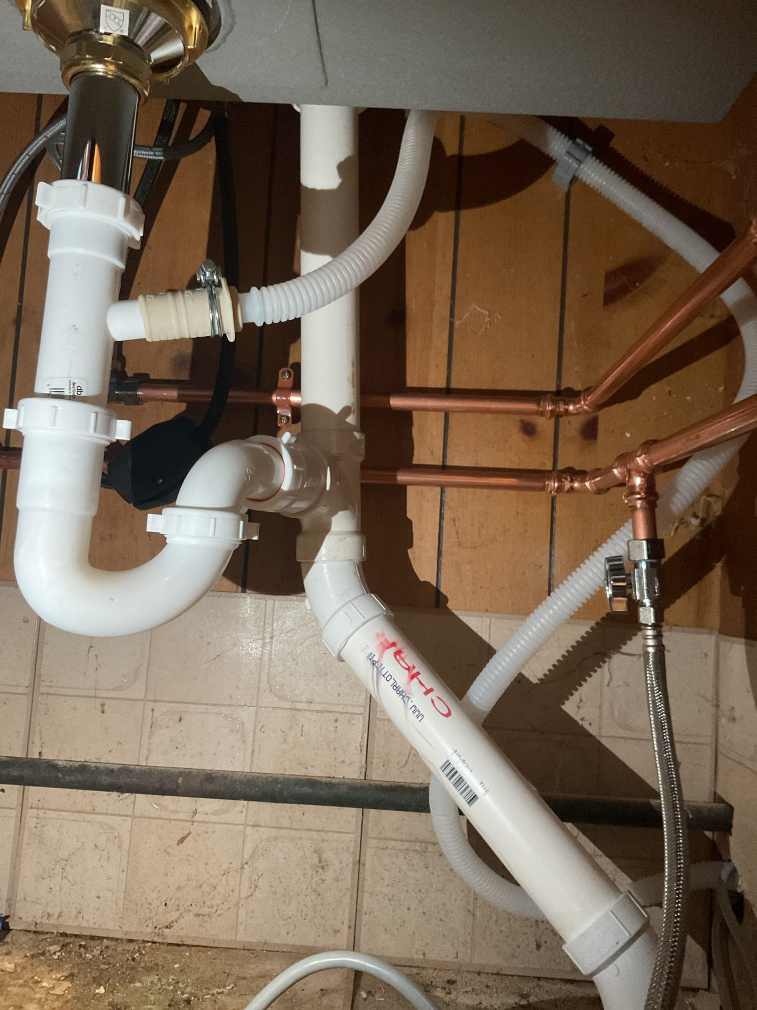 Upon arrival customer had a dishwasher, sink, and a faucet they wanted installed. They also needed to kitchen sink replumbed and needed their kitchen faucet water lines replaced, they needed two leaking gate valves replaced, along with the installation of two dedicated shutoffs for the kitchen faucet. 

I started by removing the sink and old faucet so they could install the new counter top. Once the counter top was installed I ran a new hot water line and new cold water line from the floor and supported them against the wall with bell hangers. I then installed two stop shutoff valves for the faucet and one for the dishwasher supply. I then dropped in the sink with a bead of silicone to seal it. I then installed the basket strainer, a p-trap, and an air admittance valve to give the drain proper ventilation. 

I then installed the dishwasher by connecting it to the wye tailpipe in the sink drain, hooking up to the supply with a braided line, and using the clips to secure it under the cou