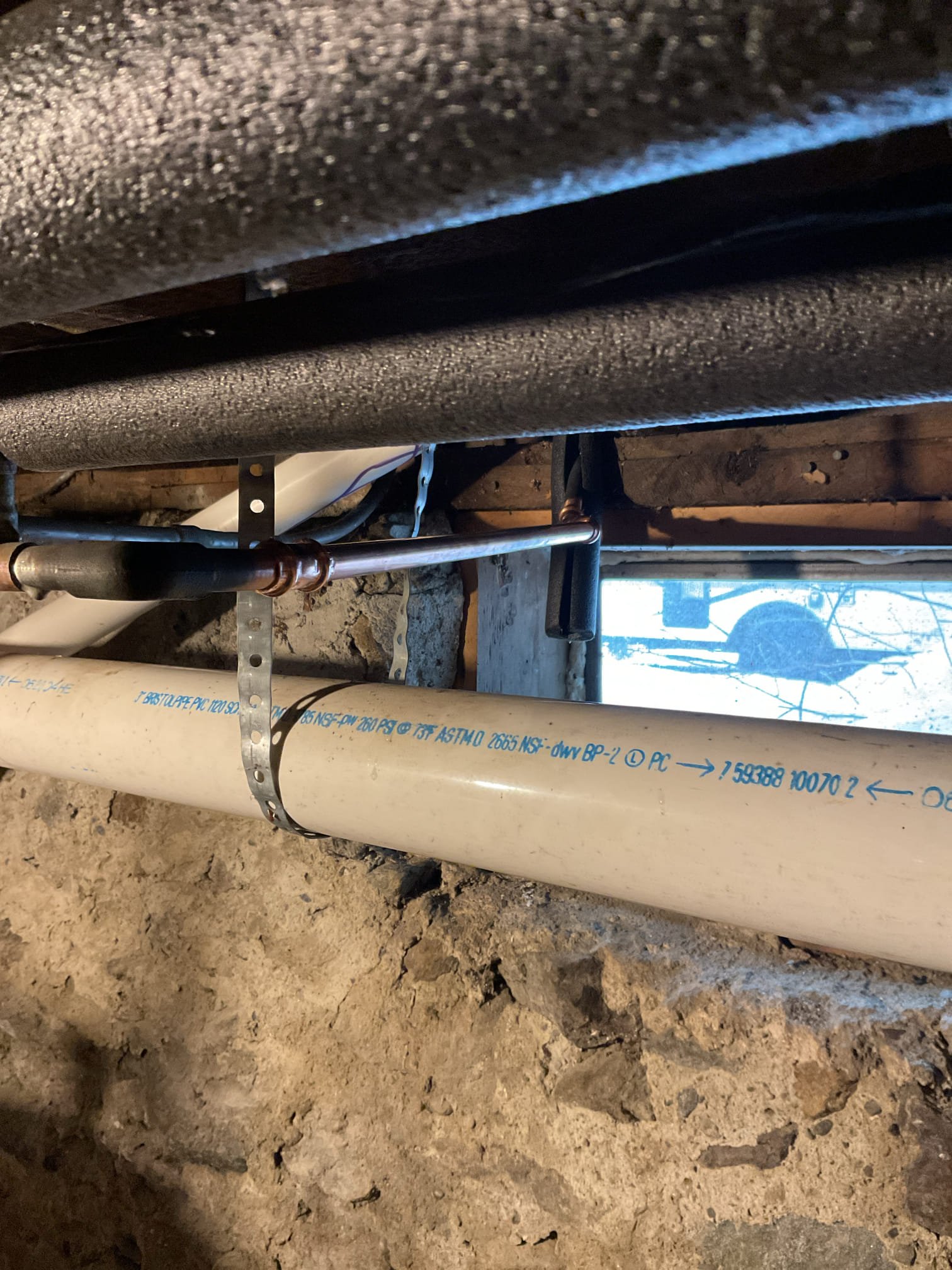 A piece of the copper water line leaking to the kitchen faucet had sprung a leak in the form of a pin hole. To remedy this issue we turned the main water supply off to the house and cut out the section of affected pipe, Installed a new piece of copper with the necessary fittings and turned the water service back on. New fittings were tested for leaks and kitchen faucet tested for proper operation. Everything functioning and no leaks detected at this time 
