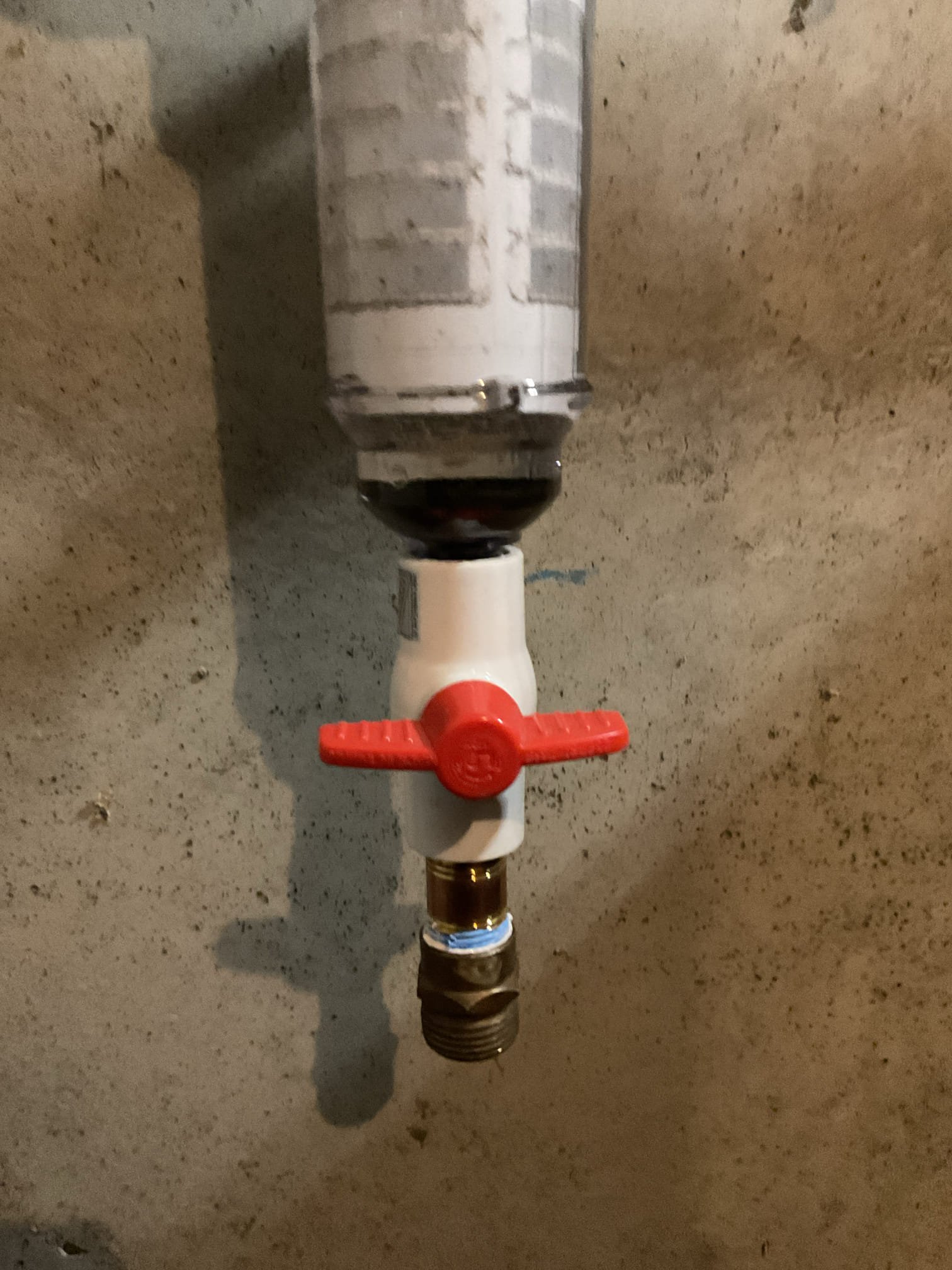 The home lacked adequate protection against sediment and debris entering the water system, which can negatively impact water quality and damage plumbing fixtures and equipment. We recommended and installed a new spin-down sediment filter to improve water quality and provide long-term system protection. To allow for proper installation, the water system was shut down and fully drained, and the pressure tank was relocated approximately 3 feet to the right due to limited clearance at the original location. The pressure tank was reconnected to the incoming well water supply and securely mounted to the wall. New piping was installed from the pressure tank up the wall into a three-valve bypass for the filter, then reconnected to the existing main water supply serving the home. All piping was properly supported with new hangers, leveled, and secured. A hose adapter was installed at the bottom of the spin-down filter to allow for easy cleaning and maintenance.

We also found the pressure switc