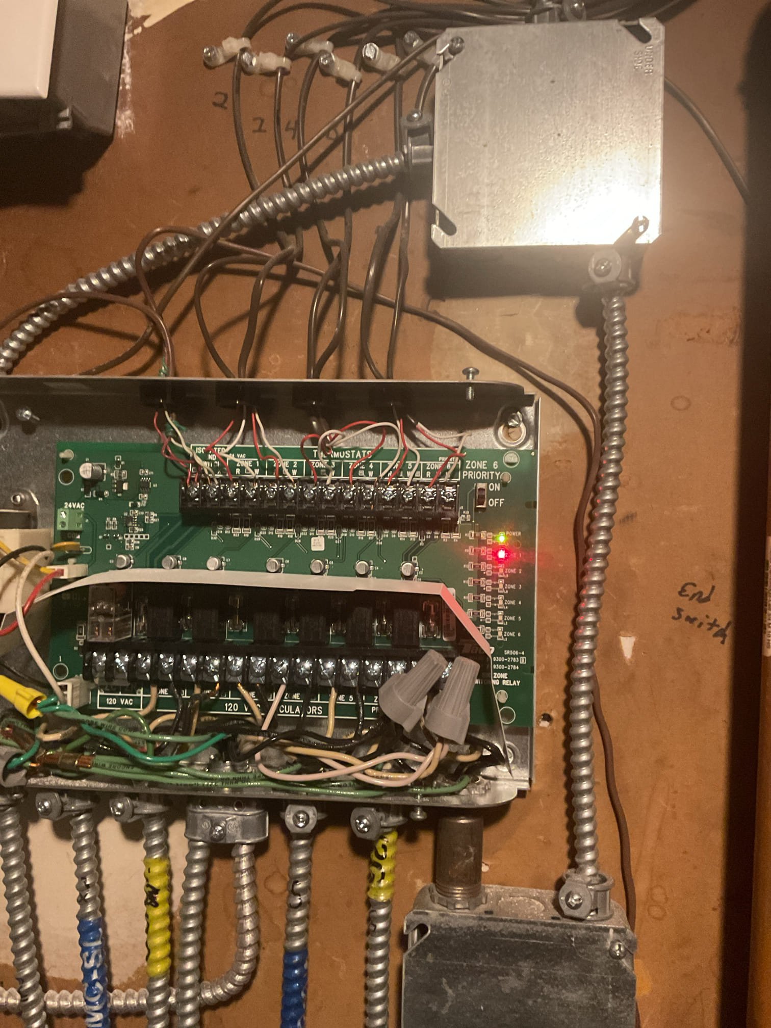 Arrived on site to diagnose no heat. From the notes, the property management already diagnosed a bad thermostat. Confirmed that thermostat had failed. When buttons were pressed the thermostat would shut off randomly. Provided an estimate to replace which was accepted. We then jumped out the zone to verify it was not the control board acting up. Boiler fired up as expected. 

We found that the board was replaced recently since we saw the old board on the floor. We found that zone 6 was set up for priority which was causing the other zones to not heat up until zone 6 was satisfied. This boiler services multiple units so there is no reason priority should be on. We believe that when the control board was replaced the installer forgot to turn the priority switch off.

We then replaced the thermostat and tested operation. The thermostat now properly calls for heat and the control board properly tells the circulator to start moving water.

Thank you for your business!