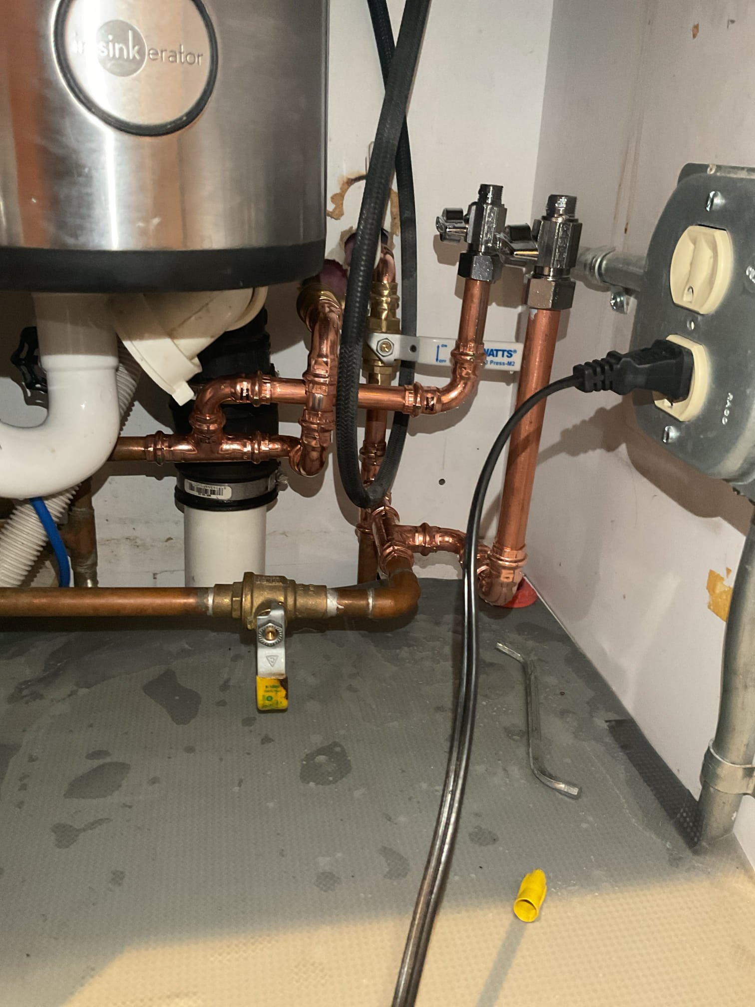 Tech went out to replace two seized up gate valves that would not fully close and to add to stop shutoff valves for the kitchen sink. I removed both gate valves under the sink and replaced them with two more reliable ball valves. I teed off before these shutoffs and installed the two faucet shutoff stop valves to ensure reliability, serviceability, and to ensure ball valves only shut off water lines running into the wall. 

I tested fixtures in every part of the house and was unable to find what the water lines go to. I went around and tried every faucet and fixture cleaning out aerators in every fixture along the way. With no success I concluded that there were capped off lines in the wall. Customer confirmed that the other side of the wall used to have a bar sink. 

I also replace the Rohl cartridge in an attempt to correct pressure issue at the fixture. I also disassembled the neck of the faucet and cleared out any debris in the valve body and all other orifices in the valve body. T