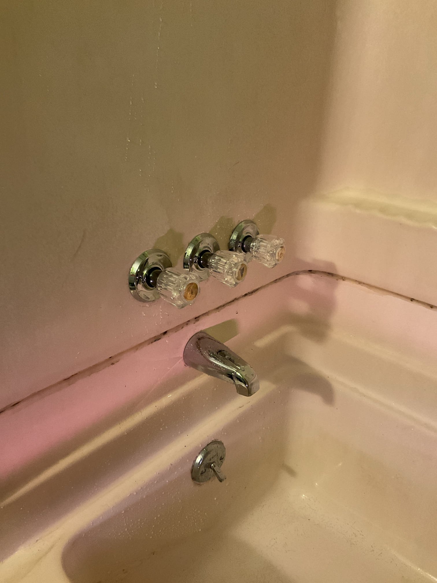 Homeowner had water leak coming from the ceiling beneath her bathroom. After our thorough evaluation we discovered there was nickel sized hole in the “shoe” of her bathtubs waste and overflow and her shower valve has a slow drip due to failed cartridges. We replaced the waste and overflow to restore proper leak free drainage. We ordered a new finish kit with cartridges for her shower to stop the dripping spout and improve appearance of the shower 

12/19/25
Service was performed to complete repairs from a previous visit by installing new three-handle shower trim and internal components that had been ordered. Upon arrival, the existing shower handles, hardware, and cartridges were removed. New handles, hardware, and cartridges were installed and properly secured.

After installation, the shower was tested for proper operation and inspected for leaks. All components operated as intended, and no leaks were observed at the time of service. The system was left in proper working order upon c