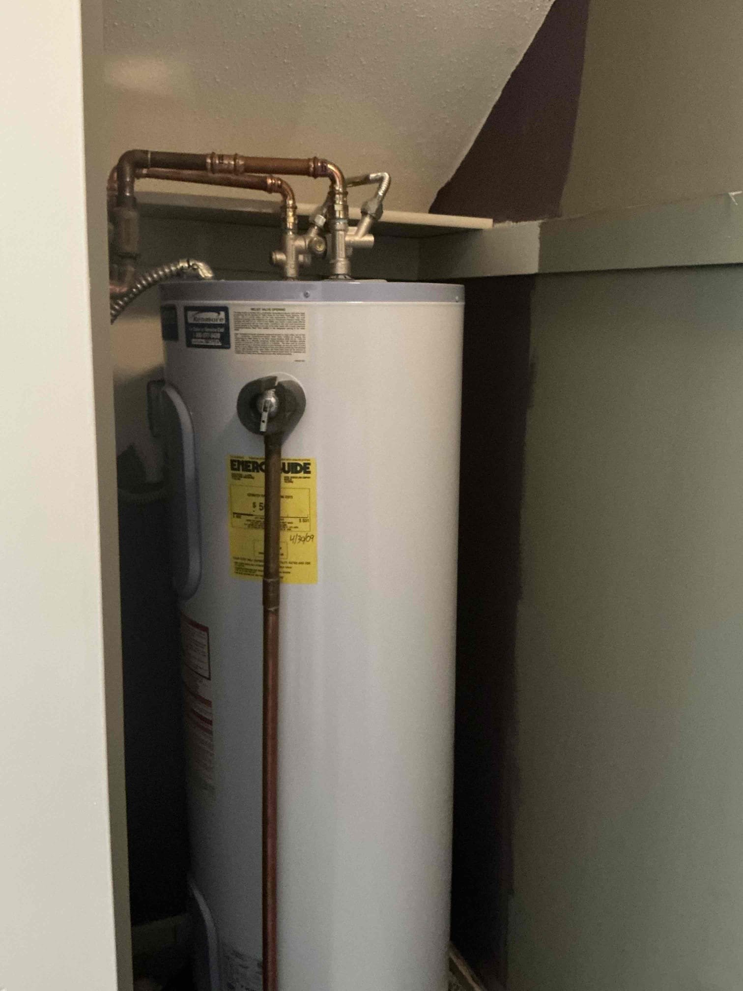 Looked at replacing 50 gallon electric water heater 