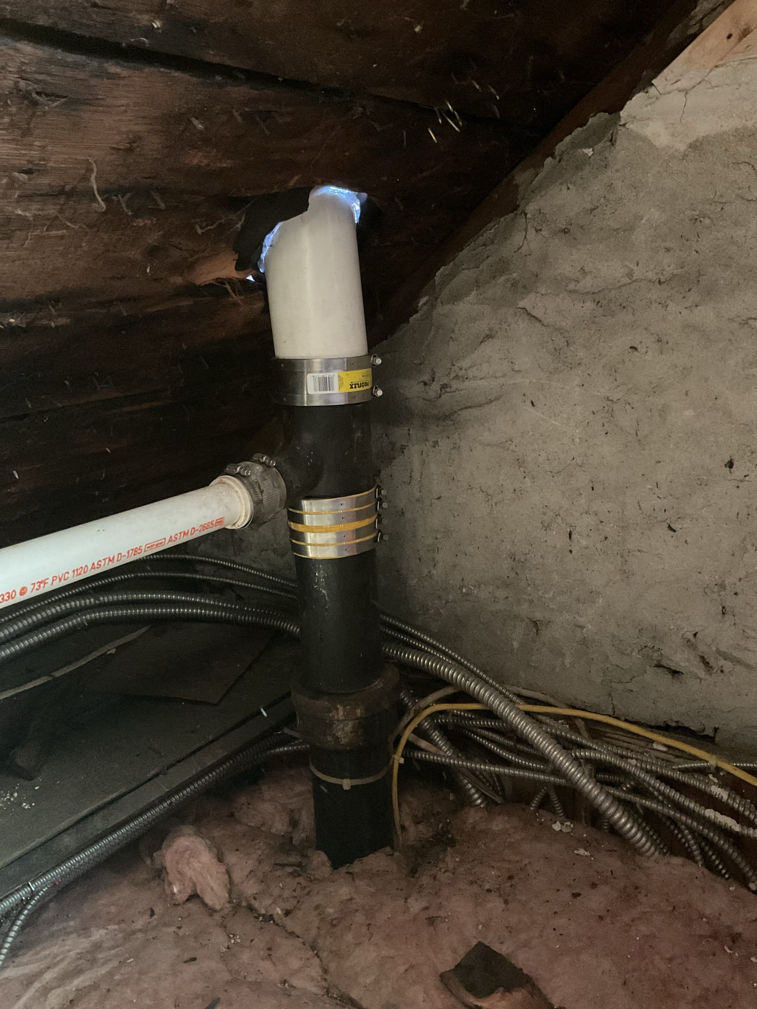 The homeowner contacted us regarding a broken vent pipe through the roof and questions about water hardness and filtration options. During our evaluation, we confirmed the vent was broken. After approval, we replaced the broken PVC pipe and clamps. The roof boot that seals the pipe into the attic had failed, so we applied a temporary silicone seal to reduce water intrusion. It is highly recommended that a roofing company install a new roof boot to ensure a permanent waterproof seal.

We also collected water samples and prepared quotes for various water treatment options to address hardness and improve water quality.