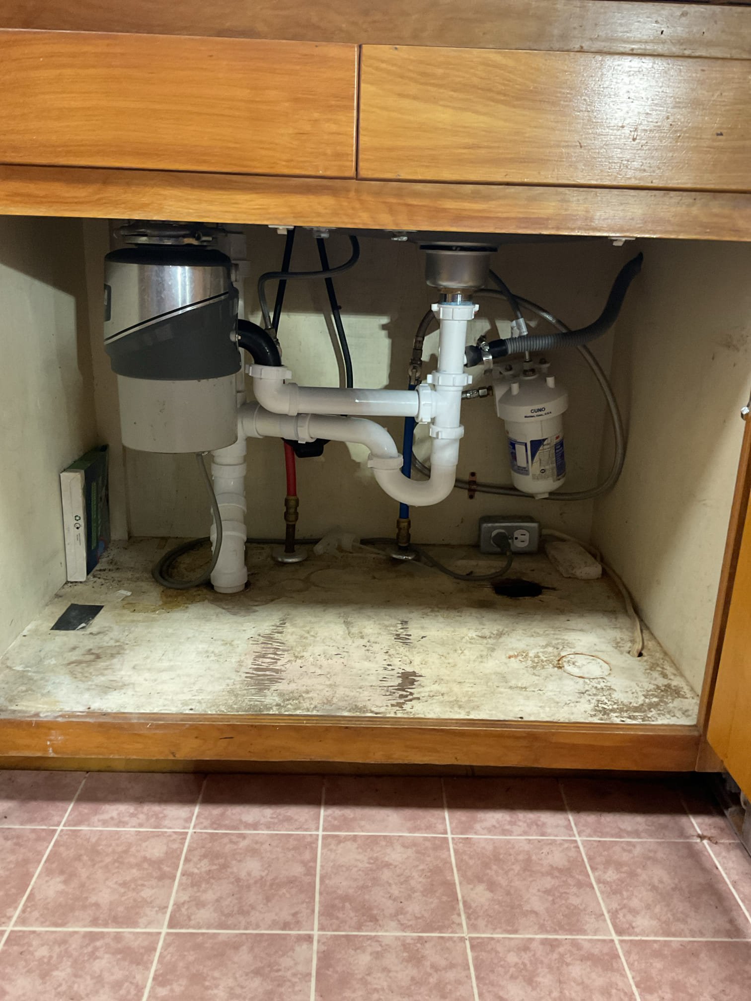 Upon arrival customer had a leaking section of  copper pipe hooked up to the sink, the dishwasher, and a vent. I removed leaking section of copper drain pipe and all plumbing beneath the sink. 

Techs installed new air admittance valve, p trap, basket strainer, and added a wye tailpiece to hook up the dishwasher discharge line. I also eliminated the capped off drain line in the cupboard along with the s trap for the dishwasher. I ran new 2” pvc drain with a clean out into existing pvc and thoroughly tested it. It’s draining well with no leaks present at time of service. 

Upon pulling out the dishwasher the dishwasher broke in both the seal on the side and in the water lines underneath the dishwasher. It was unable to be fixed. We left it disconnected and slid it into place to fill the void under the counter until it could be replaced. 

I have offered to install a new one free of charge if they would like to get a new one as a way to rectify this. 