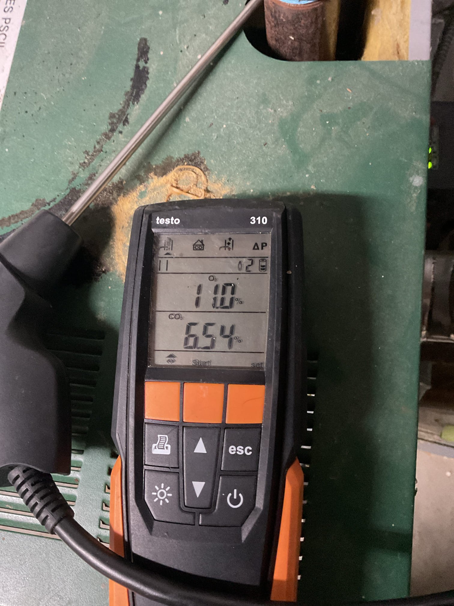 Arrived on site to diagnose no heat on propane boiler. After our initial inspection, we found that the spark igniter had some soot buildup on it.mwe cleaned it off and boiler started right up. When boiler started there was a very loud subwoofer like sound. We provided an estimate to do a tune up so we could dig deeper into the cause of the noise. It was accepted. 

We started by turning the gas off and pulling the burner tubes out. We found that they were dirty and had a lot of debris built up inside of them and the burner compartment. We wired brushed the burners and vacuumed out the compartment. We then inspected the heat exchanger which looked good. We put the burners back into place and connected pilot tube. Checked for gas leaks using bubbles. Hooked up manometer and checked gas pressure when boiler kicked on. Pressure was good and the subwoofer-like sound went away after we cleaned the burners. Performed a combustion analysis and checked for CO leaks. Analysis was good and no CO 
