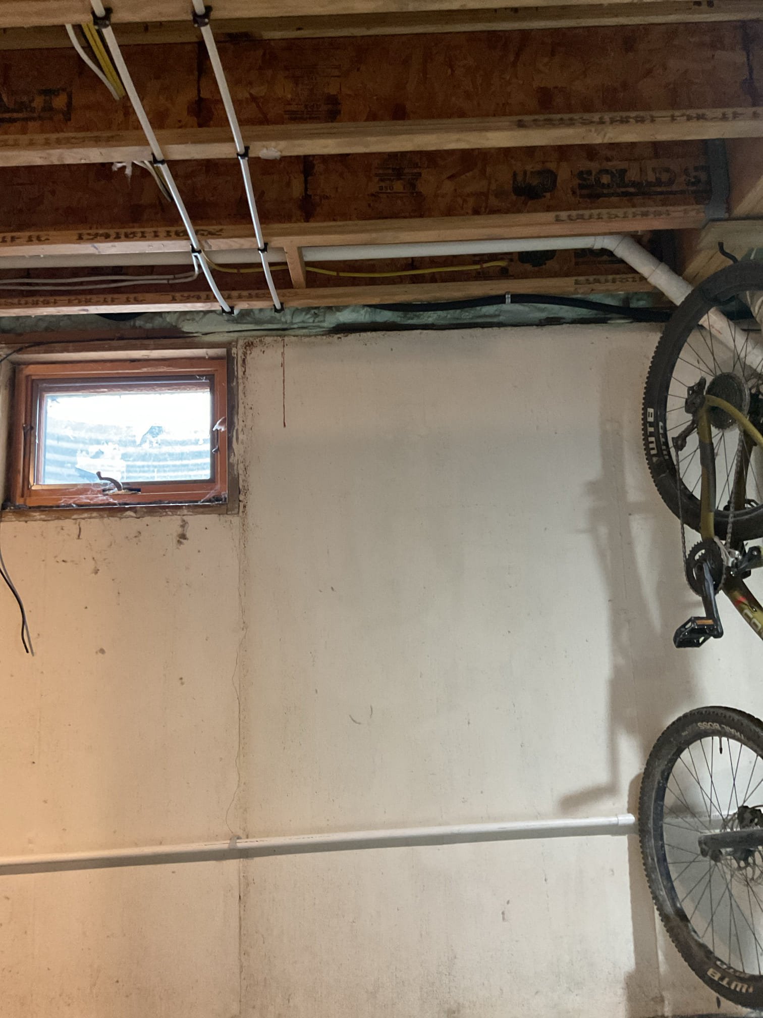 An attempt was made to clear a blockage in the kitchen sink drain. The drain line was snaked from the kitchen sink down to the 3-inch main drain, where a blockage was encountered that could not be cleared from the upstairs access point. A rubber Fernco coupling was then removed to gain additional access to the line, allowing the drain to be snaked from that location. The blockage was successfully cleared, and the kitchen sink was tested and is now draining properly. All components were reinstalled and secured, and the drain system is functioning as it should.