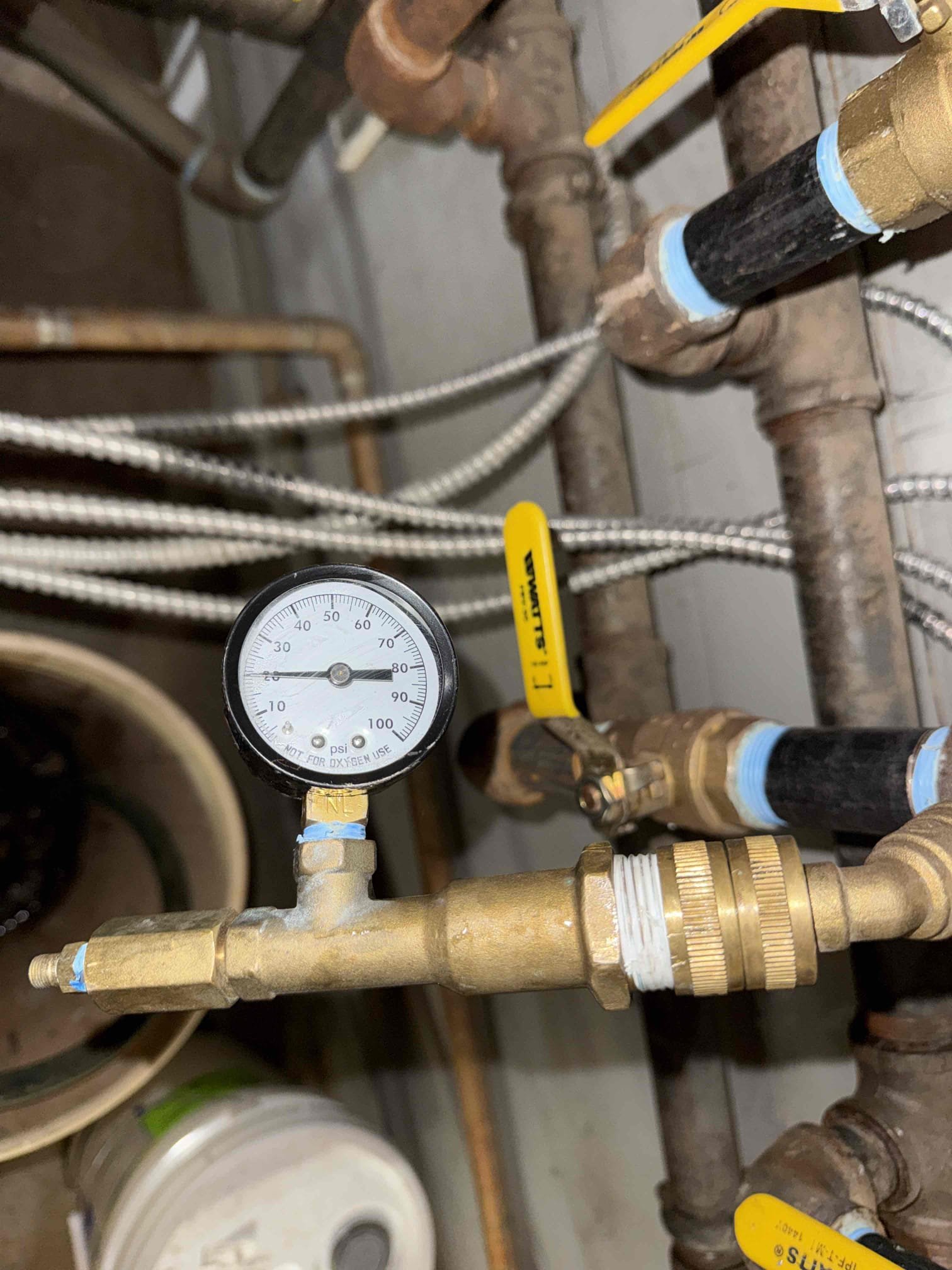 Upon inspection, a section of baseboard piping was found to be burst near a 90-degree fitting located within an exterior wall. The damaged piping was removed and replaced with new 3/4” heating-rated PEX piping to allow for improved expansion tolerance in the event of future freezing. The transition from the existing copper piping to the new PEX was completed using two 3/4” copper-to-PEX adapters, along with one 3/4” PEX 90-degree fitting to properly route the piping at the corner.

All accessible piping was insulated with foam insulation to provide additional protection against freezing. The heating loop was then pressurized with air and tested for leaks, with no pressure loss observed during testing. The loop was subsequently refilled with water, checked again for leaks, purged of air, and fully tested for proper operation. At this time, the system is functioning as intended. We recommended adding the proper glycol mixture to the system for freeze protection; however, the homeowners e