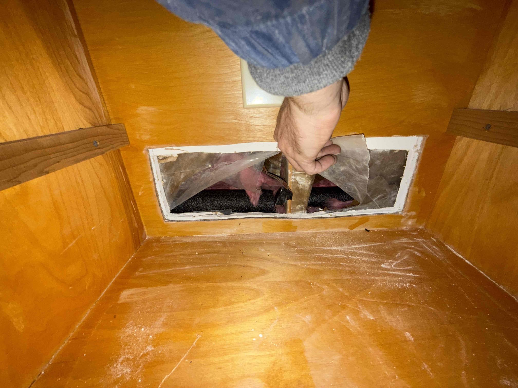 Upon inspection, a section of baseboard piping was found to be burst near a 90-degree fitting located within an exterior wall. The damaged piping was removed and replaced with new 3/4” heating-rated PEX piping to allow for improved expansion tolerance in the event of future freezing. The transition from the existing copper piping to the new PEX was completed using two 3/4” copper-to-PEX adapters, along with one 3/4” PEX 90-degree fitting to properly route the piping at the corner.

All accessible piping was insulated with foam insulation to provide additional protection against freezing. The heating loop was then pressurized with air and tested for leaks, with no pressure loss observed during testing. The loop was subsequently refilled with water, checked again for leaks, purged of air, and fully tested for proper operation. At this time, the system is functioning as intended. We recommended adding the proper glycol mixture to the system for freeze protection; however, the homeowners e