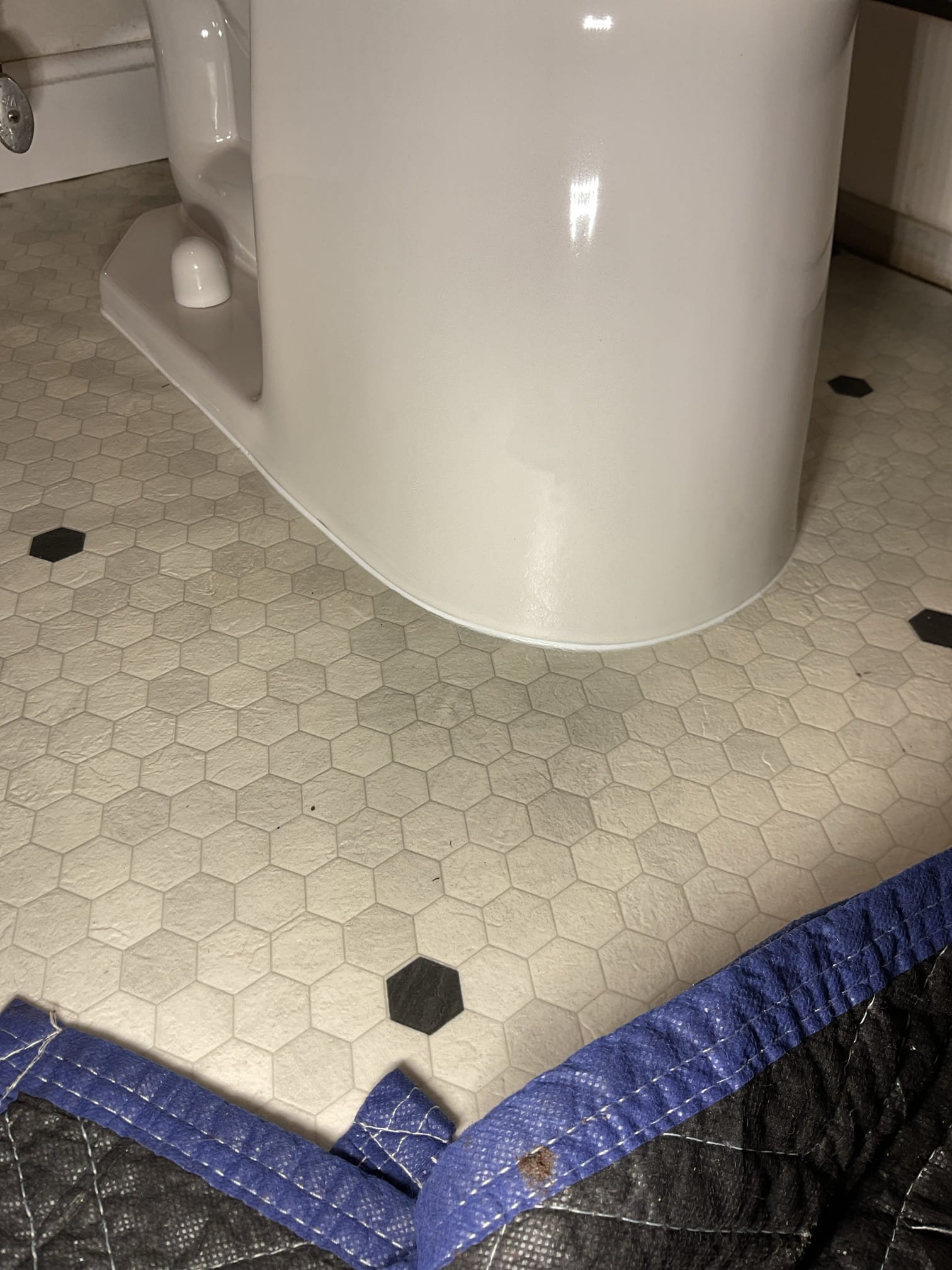 Upon arrival customer had a toilet that was not flushing. Flush tower was broken and not opening. Customer decided to replace the toilet outright. Tech removed the supply line and toilet. Upon pulling the toilet I found that it was rusted and not structurally sound enough to reuse. 

I removed the old flange and replace it with a spacer and a repair flange ring. I mounted the repair flange to the floor and set the toilet. I flushed the toilet repeatedly and found it was working well with no leaks. I the caulked the base of the toilet with clear cure silicone. 