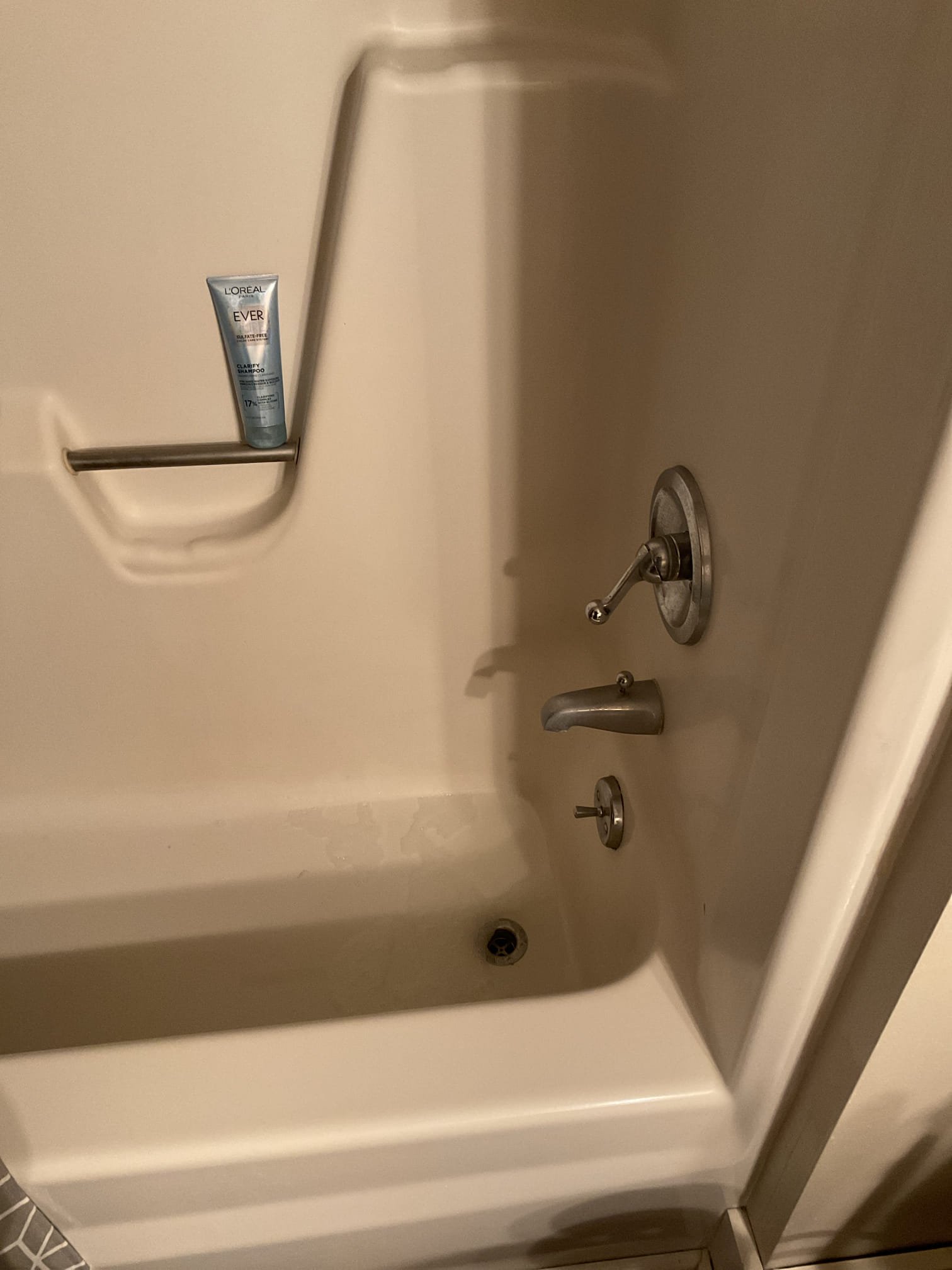 The bathtub was initially draining but doing so very slowly. An attempt was made to improve drainage by treating the drain with Thrift. After the treatment, the tub was tested and showed a significant improvement in drainage, flowing the way it should. The customer verified that the bathtub was draining much better following the treatment.