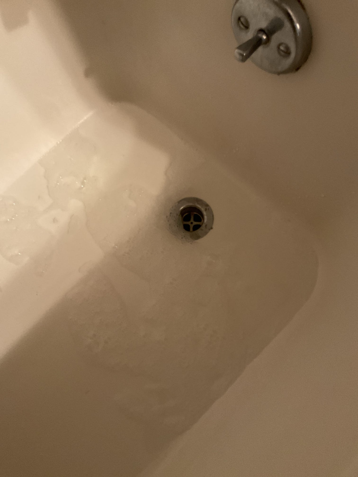 The bathtub was initially draining but doing so very slowly. An attempt was made to improve drainage by treating the drain with Thrift. After the treatment, the tub was tested and showed a significant improvement in drainage, flowing the way it should. The customer verified that the bathtub was draining much better following the treatment.