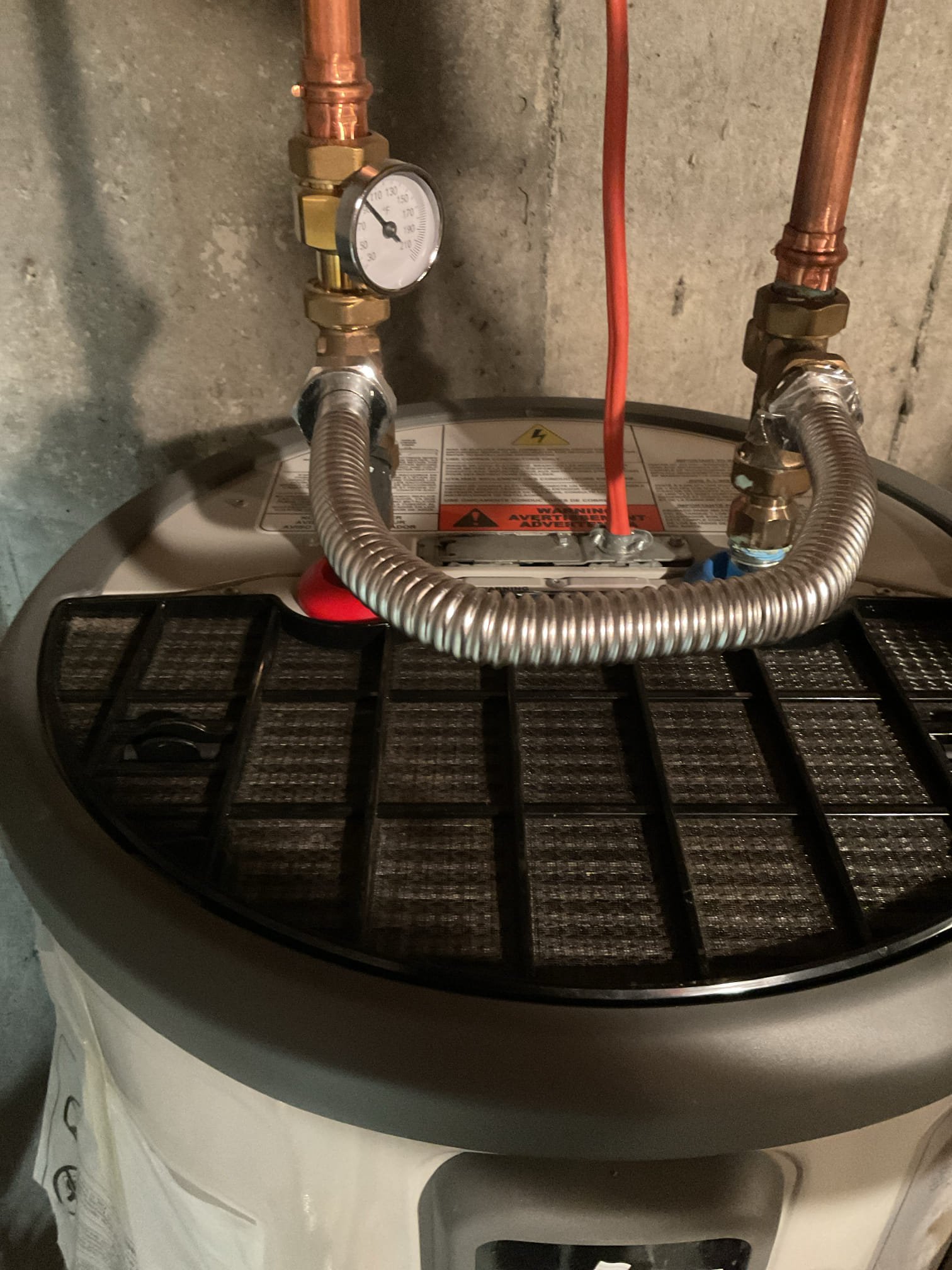 The icemaker shutoff valve was found to be failing and allowing water to pass through when closed. We replaced the valve to restore proper water control and reduce the risk of leaks or water damage. The home’s water was shut off, the system was drained, the defective valve was removed, and a new shutoff valve was installed. Water pressure was then restored and tested for proper operation. It was noted that the refrigerator itself is leaking not water connection and was shut off to prevent any further damage.

During the process of restoring water service, the pressure reducing valve (PRV) was observed leaking at the gasket seal due to age and deterioration. Replacement was recommended and approved to stop the leak, maintain proper water pressure, and protect the plumbing system. The water was shut off again and the system drained, the existing PRV was removed, and it was observed that the existing gate valve was slowly passing water. A new PRV was installed and set to 55 PSI, along wit