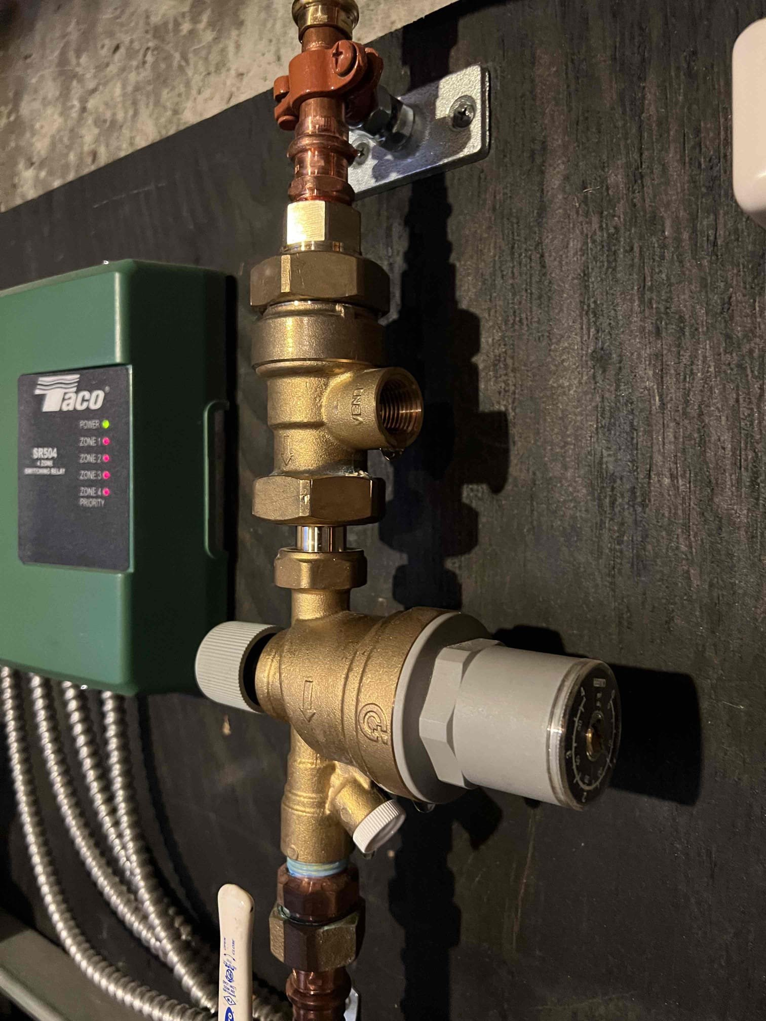 Arrived onsite to investigate a water leak from the heating system. The leak was coming from the backflow preventer vent. I replaced the backflow preventer and verified there are no water leaks at this time. 