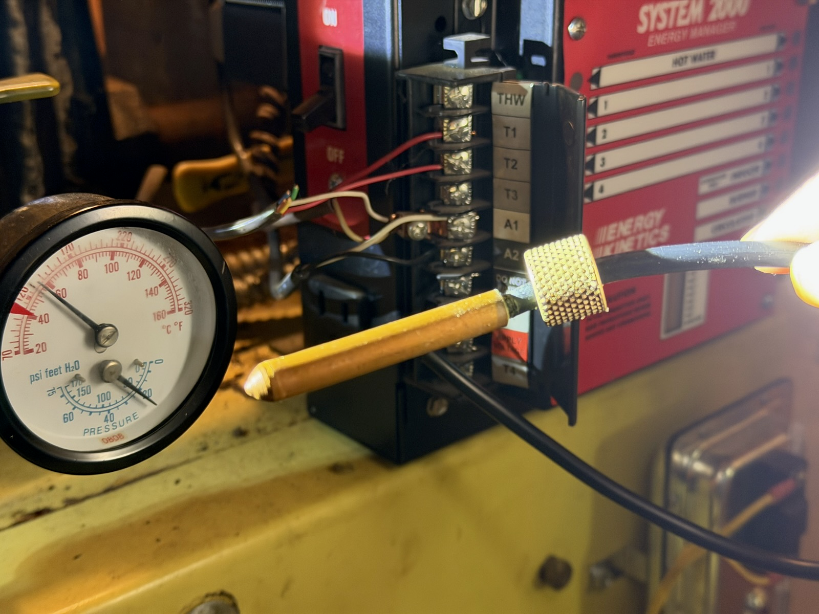 Replaced the temperature sensor on the system 2000 boiler and tested for proper operation. Flashing 100 code is now gone and the boiler is coming up to temp, turning off, and responding to the thermostat