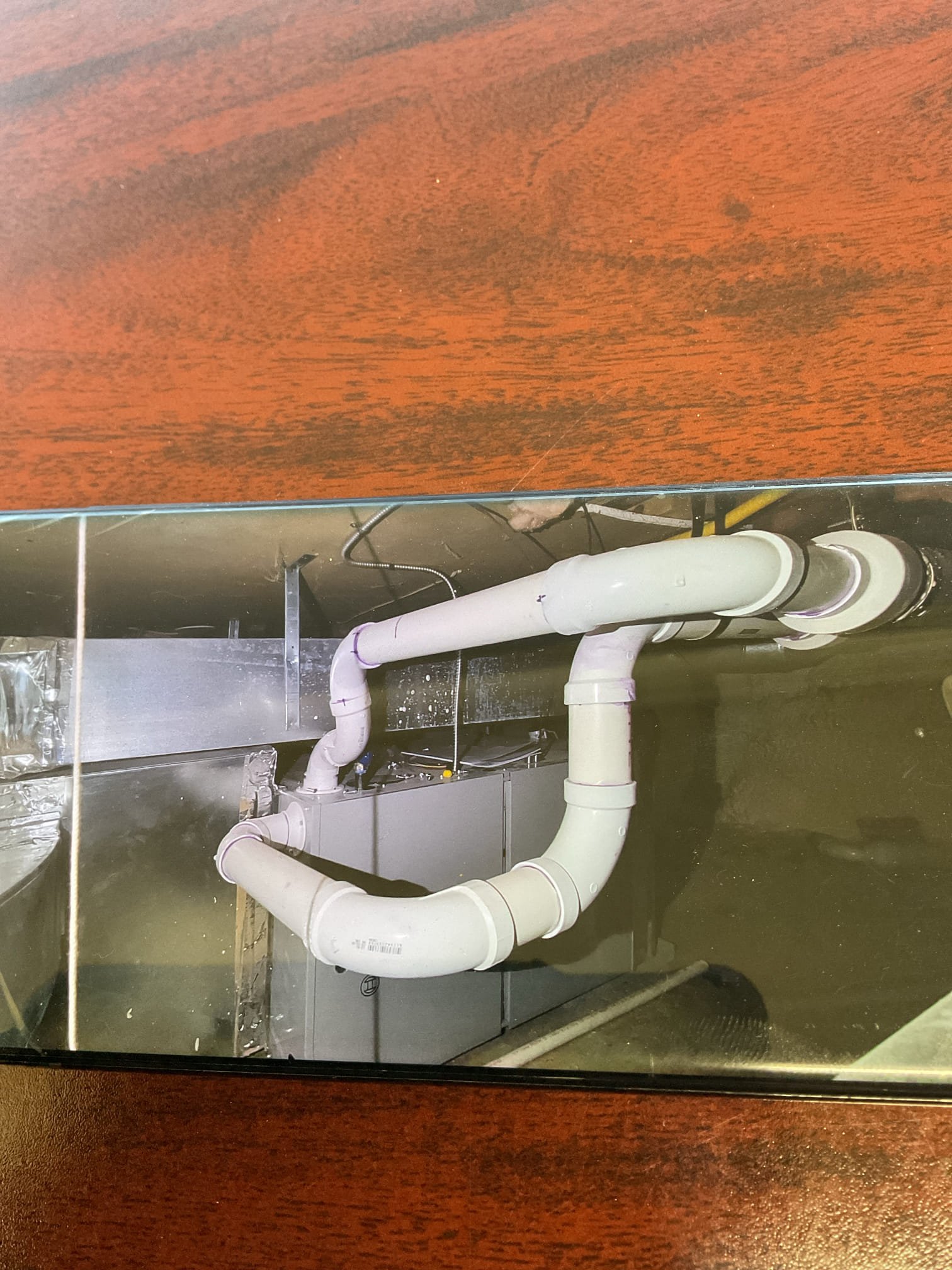 12/29/25 - Arrived on site to replace failing propane furnace. We started by verifying gas and power supply were turned off. We then removed gas piping and capped gas line until we were ready to connect. Removed electrical box. We had to disconnect a lot of the ductwork to be able to remove the old furnace from the crawlspace. We attempted to put the new furnace down into the crawl but found that we will need an extra set of hands in the morning to get it down safely and without damaging the unit. We will return in the morning to continue the installation.

12/31/25 - Arrived on site to finish the install. We installed the venting making sure it was slightly back pitched toward the furnace for proper drainage. We then installed the condensate line making sure to install a trap to allow for proper drainage. We converted the gas valve and manifold to allow for burning of propane gas. Set the gas pressure to what the manufacturer specified. Checked for gas leaks and for CO. No leaks prese