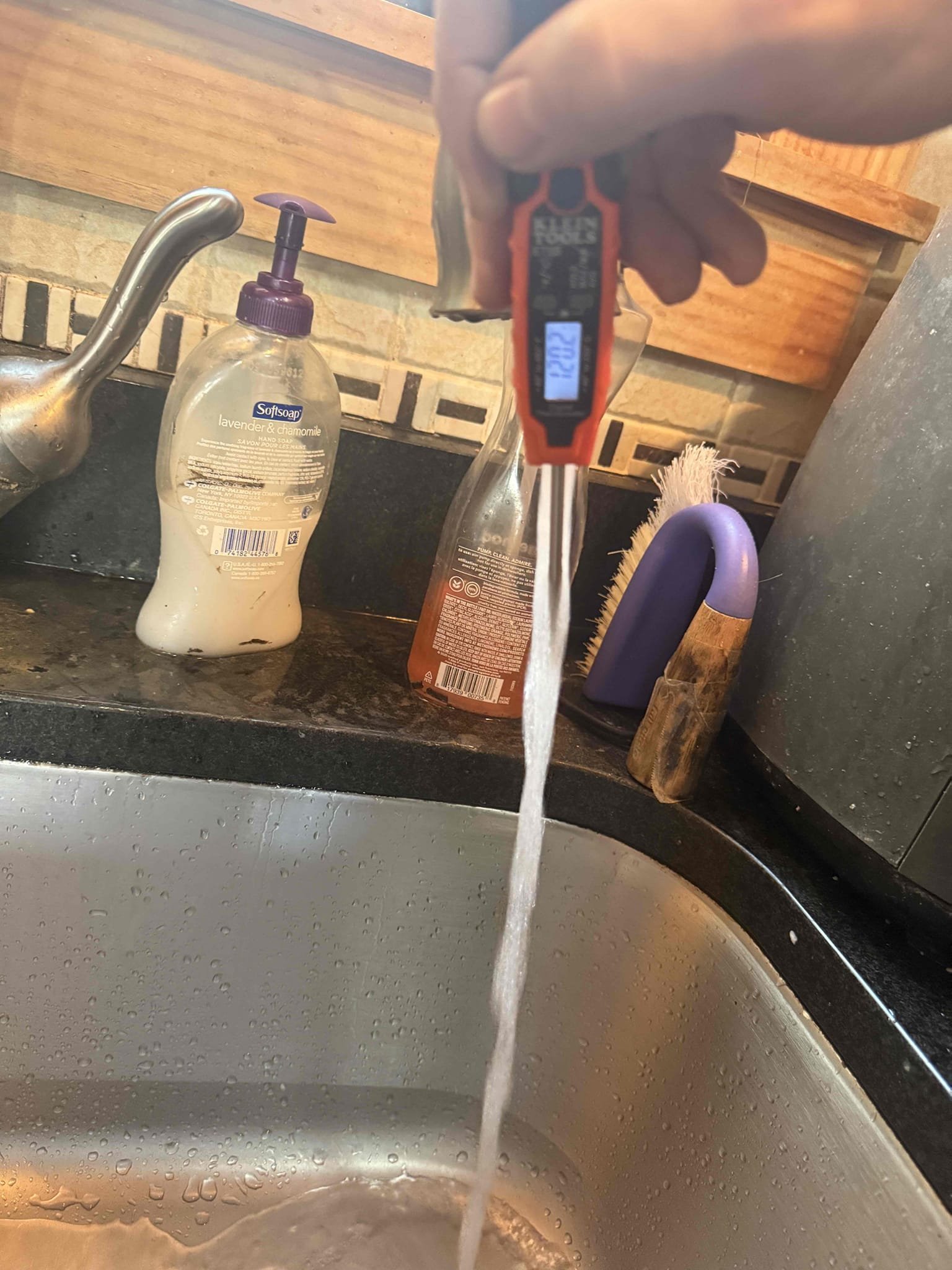 The customer reported a DHW (Domestic Hot Water) error on a Buderus oil boiler. Upon inspection and testing, the DHW temperature sensor was found to be faulty. The failed sensor was replaced with a new one. After installation, hot water temperature at the faucet was tested and measured 140°F. The temperature was then adjusted down at the Logamatic control. A follow-up test at the faucet showed a stable temperature of 120°F. The new sensor was verified to be satisfied at 120°F and stopped calling for hot water as designed. The system is operating properly at this time.