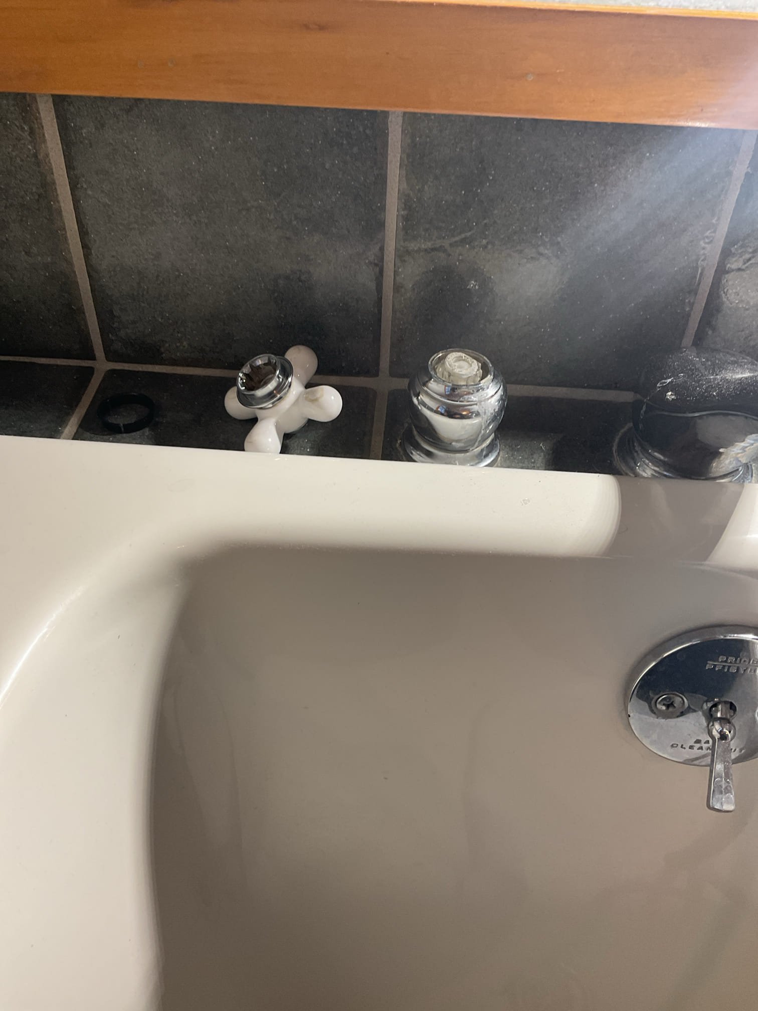 For this visit, the homeowner reported that the hot handle on the Roman tub faucet was not operating properly. Upon inspection, we found the plastic handle adapter was broken and the brass handle insert was freely spinning, preventing proper engagement of the cartridge; the appropriate replacement parts were identified, and estimates for replacing the handles, adapters, and cartridges were provided and emailed to the customer for approval, as the parts are not currently available.