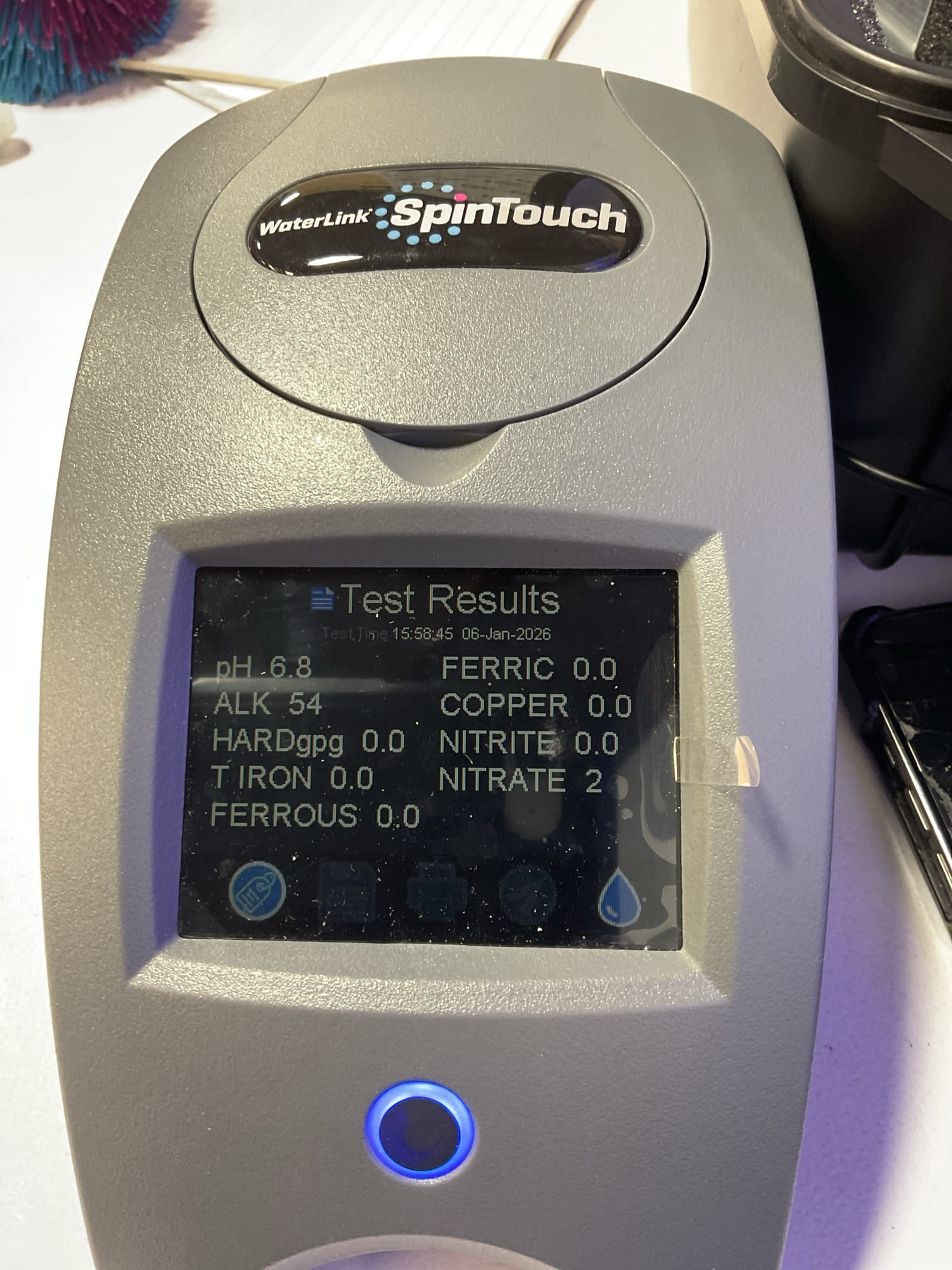 The spin-down sediment filter was found to be improperly supported, placing strain on the system and making maintenance difficult. We recommended installing proper hanger supports and removing the filter screen for cleaning to improve system reliability and ease of future service. The filter was set in bypass and the drain valve opened to relieve system pressure. The housing was carefully removed by hand, the screen rinsed to clear trapped debris, and both screen and housing were reinstalled using silicone lubricant and tightened by hand. The system was returned to service and tested, confirming proper operation with no leaks.

During this visit, we also inspected the water quality equipment. The water softener and acid neutralizer were both approximately 18 years old, exceeding their effective service life, and the water softener showed a minor leak at the top of the unit. Replacement of both units is recommended. Additionally, the pressure tank, original to the home (1994), showed co