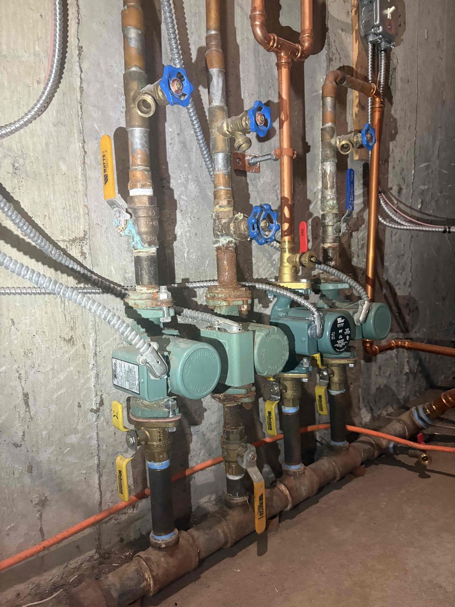 Responded to a report of overheating in the two upstairs bedrooms. During investigation, it was determined that despite the initial evaluation of the zone piping, the upstairs bedroom is tied into a continuous loop with the master bedroom and master bathroom. This configuration prevents the recently completed work from effectively isolating the bedroom under its own thermostat, as the rooms are not independently zoned.

All upstairs piping is inaccessible, and because the spaces are connected on a single continuous run, isolating one bedroom would require running new supply and return piping from the boiler. While this is technically possible, it would involve locating piping within floors and walls and creating access openings to complete the work.

At this time, alternative thermostat options are being evaluated to improve temperature control between the two rooms without invasive piping modifications. Further research is ongoing, and follow-up will be provided shortly with a recomme