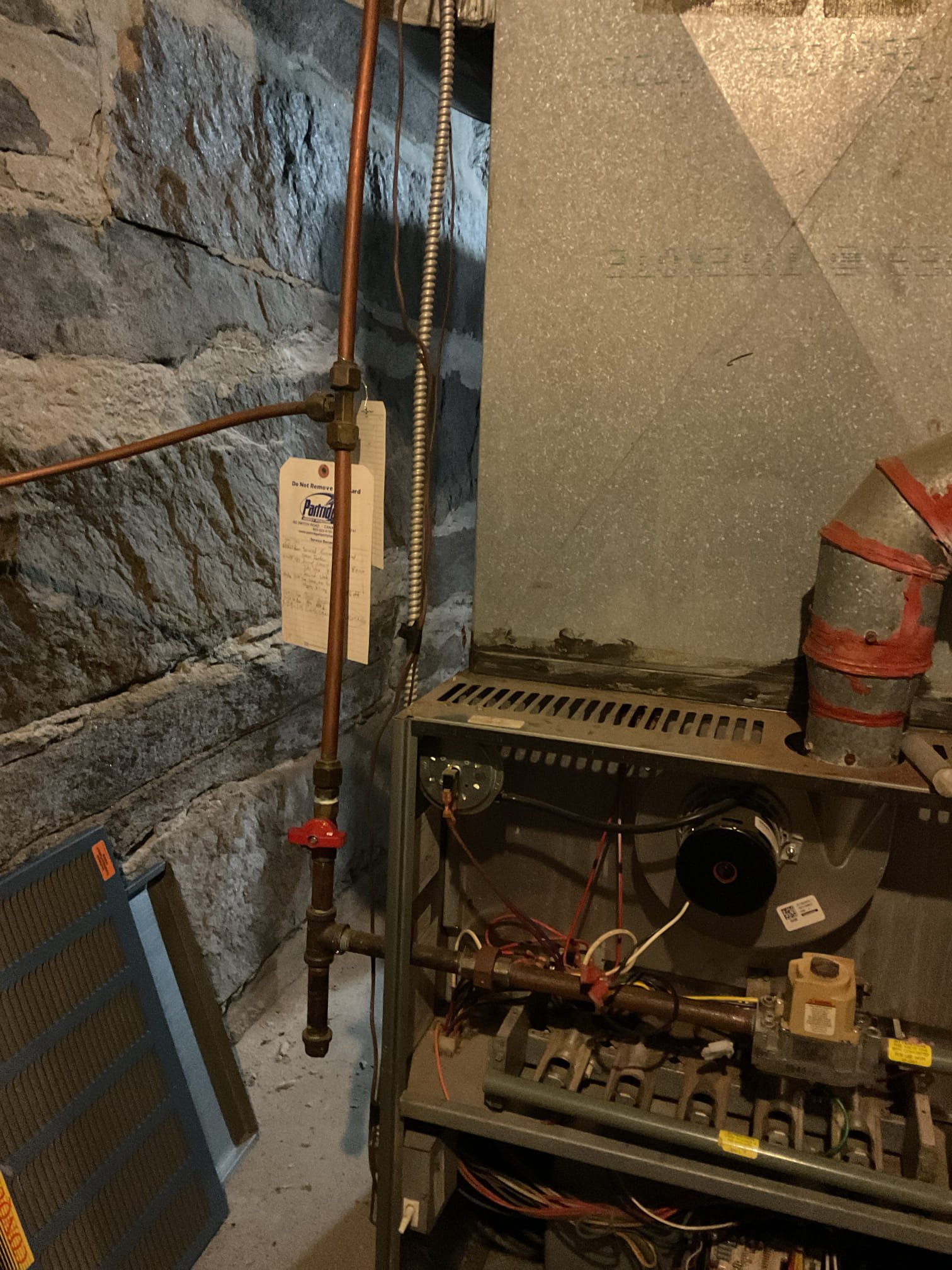 Arrived on site to perform a tune up on propane furnace. Upon first inspection, we found that the igniter and burner tubes needed to be replaced. After providing estimates for both parts, we continued on with the tune up. When we were testing the system we found evidence that the heat exchanger is cracked. We performed a lighter test at the burners and found the flame was sucked right into the heat exchanger which leads me to believe there is a hole or crack somewhere allowing the blower fan to suck combustion gases through and into the ductwork. 

Unfortunately we had to disable the furnace. We took measurements of the ductwork and pictures of the general area so we can properly provide an estimate to replace the furnace.

Thank you for your patience.