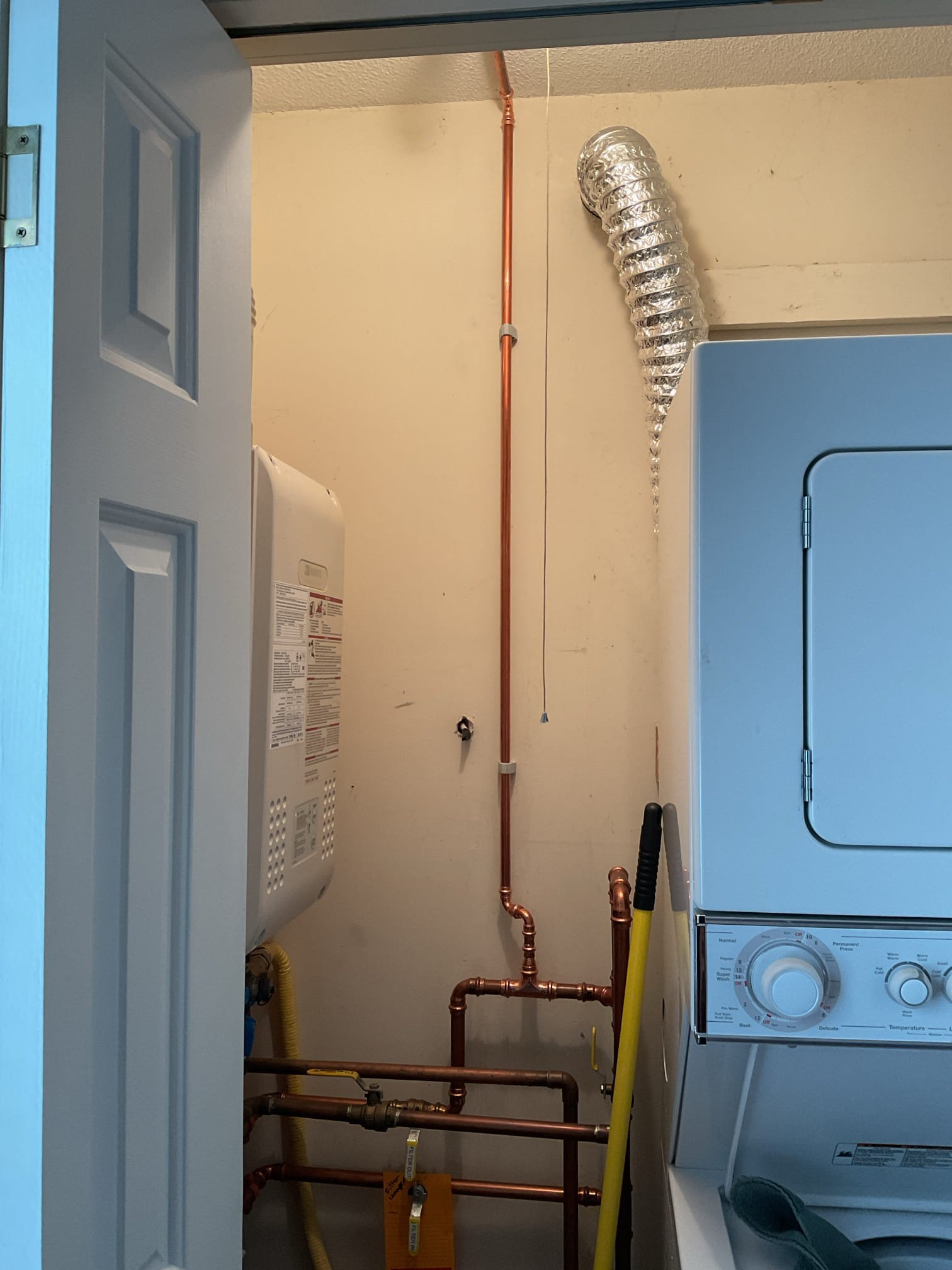 A fire code requirement was identified for the water heater location, requiring a fire suppression sprinkler head to be installed above the unit. A code-compliant sprinkler head was professionally installed in accordance with applicable fire regulations, ensuring improved fire safety, regulatory compliance, and readiness for inspection.
