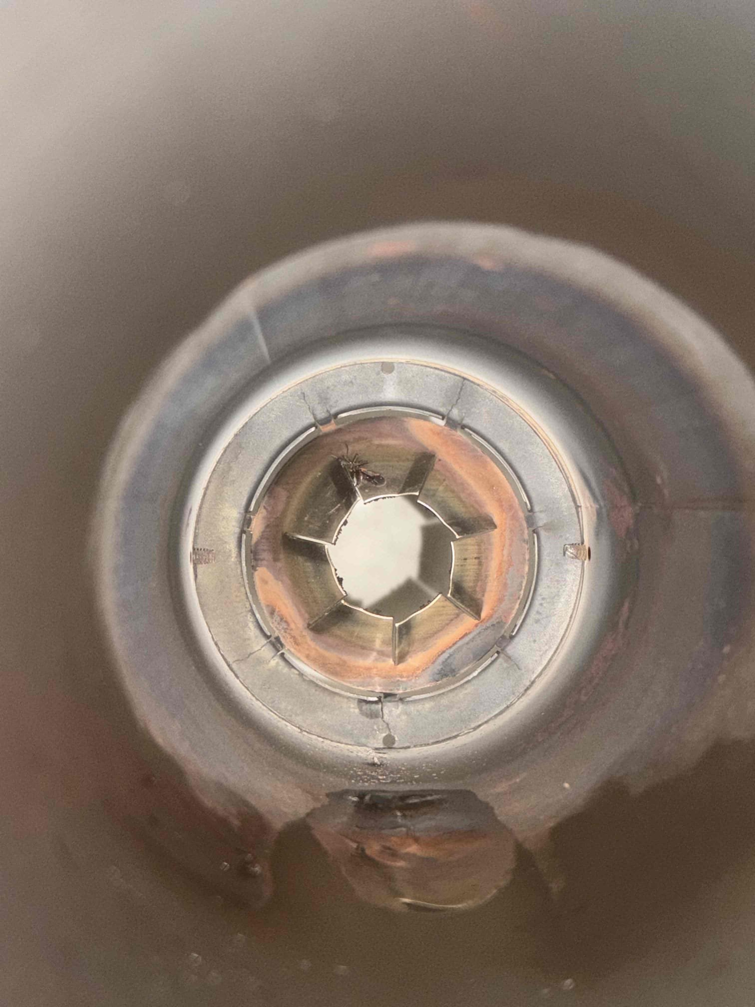 Performed annual maintenance on the oil furnace, including replacement of the nozzle, oil filter, and strainer. Cleaned the heat exchanger and flue pipe by brushing and vacuuming. Tested and verified proper operation of all burner components and system safeties. Inspected the fan motor and all associated components and confirmed proper operation. Performed combustion analysis, smoke test, and draft test.

During the inspection, multiple cracks were identified in the combustion head. With customer approval, the F3 combustion head was replaced and proper operation was confirmed after installation.

The system is operating properly at this time.