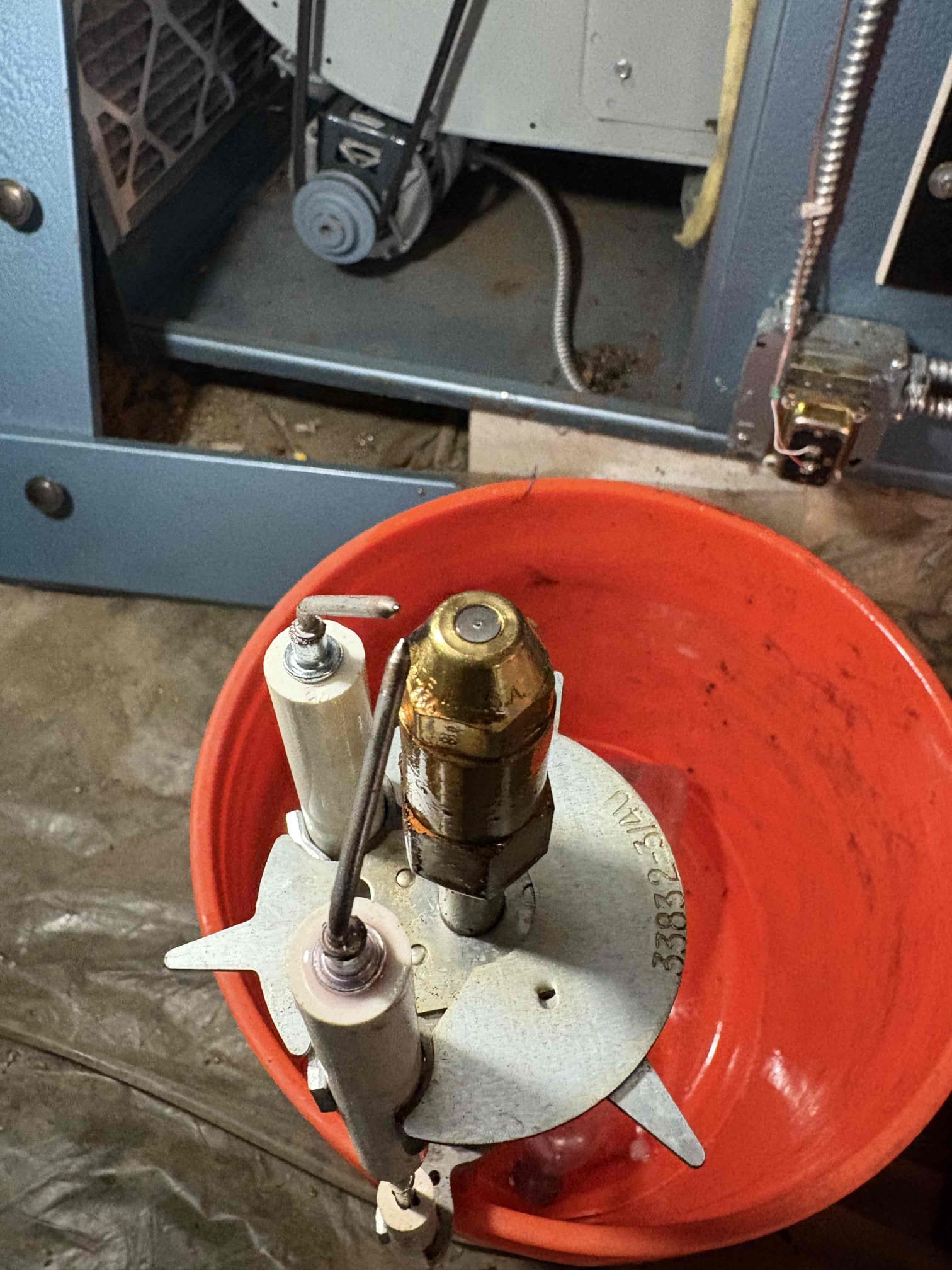 Performed annual maintenance on the oil furnace, including replacement of the nozzle, oil filter, and strainer. Cleaned the heat exchanger and flue pipe by brushing and vacuuming. Tested and verified proper operation of all burner components and system safeties. Inspected the fan motor and all associated components and confirmed proper operation. Performed combustion analysis, smoke test, and draft test.

During the inspection, multiple cracks were identified in the combustion head. With customer approval, the F3 combustion head was replaced and proper operation was confirmed after installation.

The system is operating properly at this time.