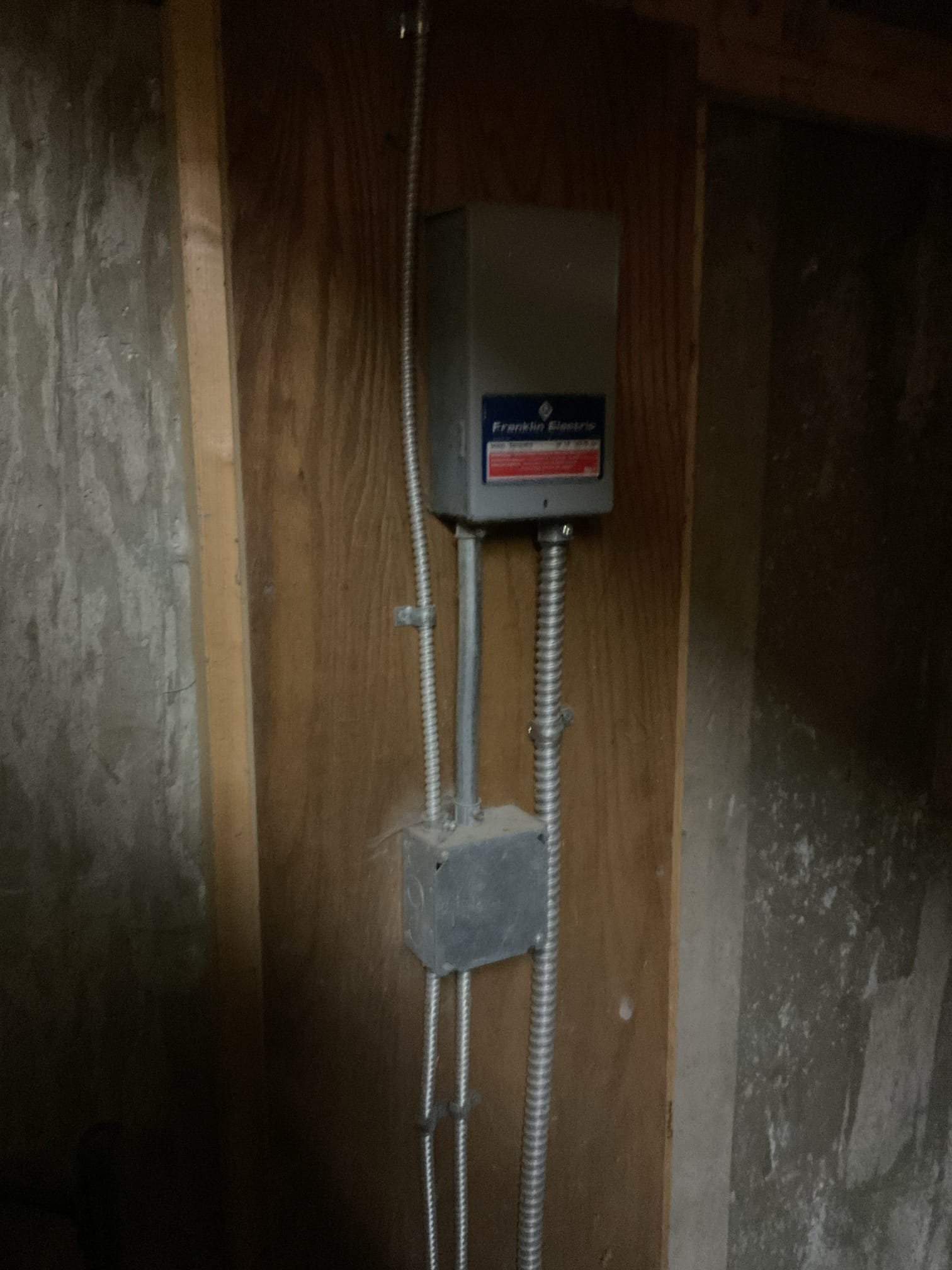 We found the property was experiencing a complete loss of water service with an unknown cause upon arrival. A full well system diagnostic was performed, which revealed the circuit breaker tripped on startup and the breaker produced a loud humming noise consistent with pump failure.

We confirmed the pressure switch was operating properly with 240V present on all terminals and adjusted the pressure tank air charge from 35 PSI to 38 PSI. The control box was removed and inspected, where a failed capacitor was found; a temporary replacement ¾ HP control box and additional capacitor were installed for testing with no change in system operation. Continuity testing confirmed wiring was intact, however pump ohm readings showed abnormal values—yellow/black reading slightly high and red/yellow significantly out of range—confirming internal pump failure.

Based on these findings, we determined the well pump has failed and is the cause of the no-water condition. Replacement of the well pump and ch