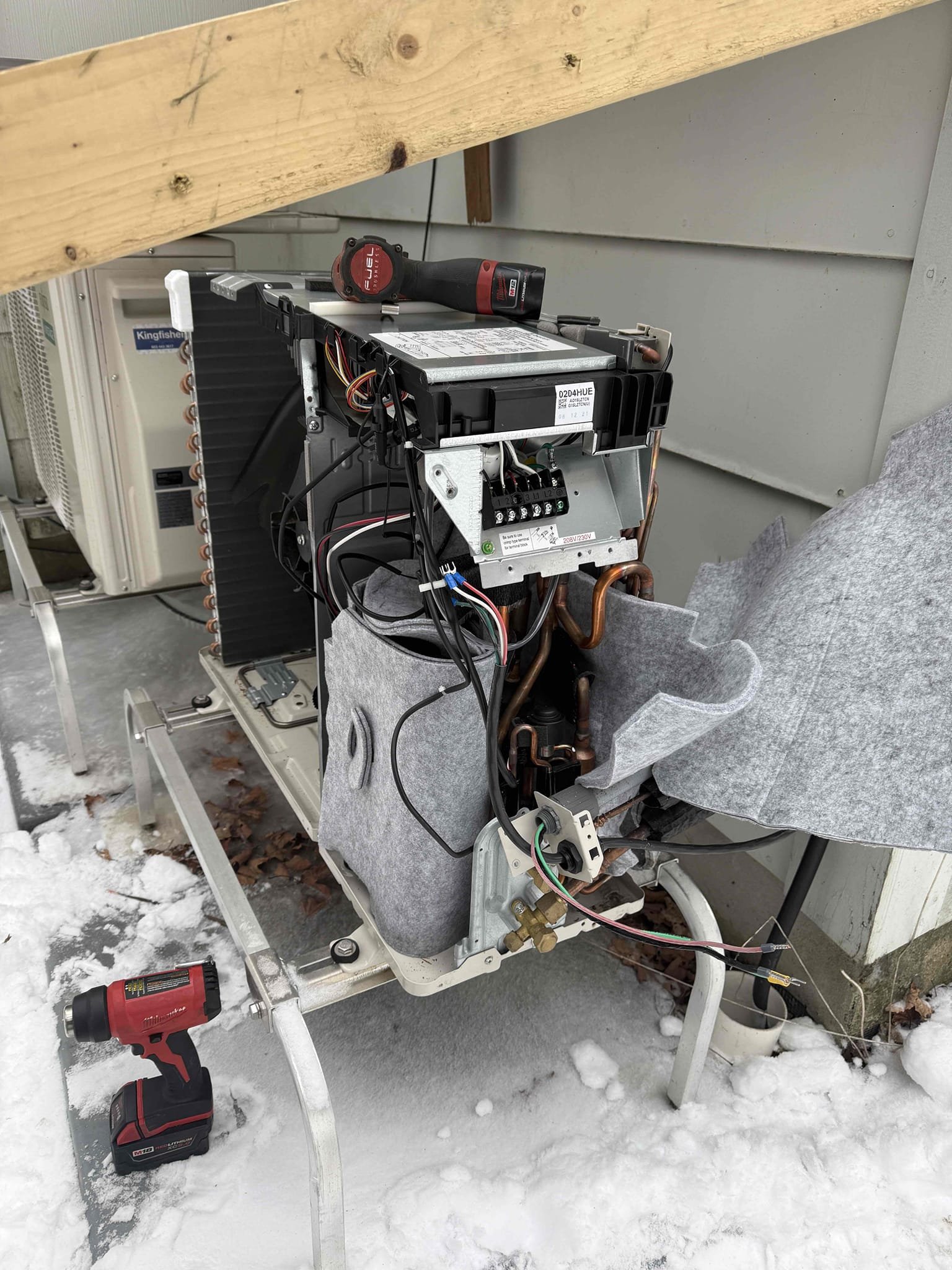 Removal and replacement of the outdoor coil thermistor that is not accurately sensing temperature. The failed thermistor prevents proper defrost operation, allowing the outdoor condenser coil to freeze. Replacing the thermistor restores correct temperature sensing and proper system operation.

1-8-2025 Removed the unit housing and replaced the compressor thermistor and thermistor assembly. After reassembling, the unit was powered on and operating temperatures were verified to be within specifications. The unit was allowed to run to observe a defrost cycle, which initiated and completed successfully. At this time, the unit is operating properly with no further issues observed.