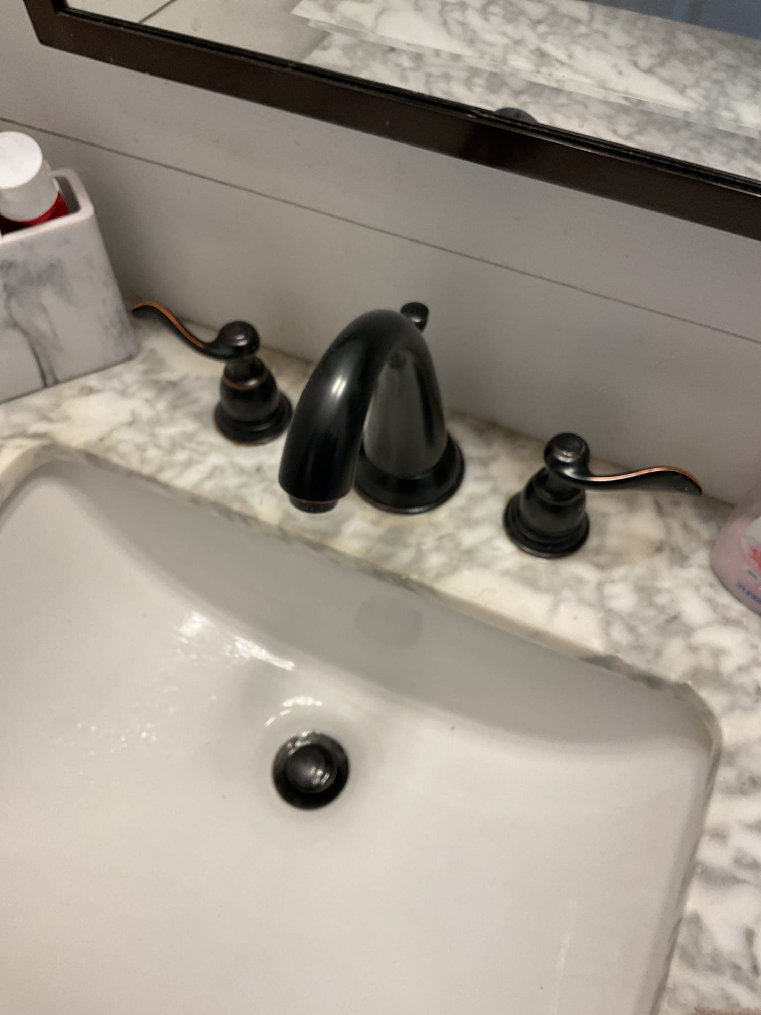 For this job, we evaluated the bathroom widespread faucet and found that it was leaking from the faucet head, indicating an internal failure. Due to the nature of the leak, the faucet is not repairable and requires full replacement. The existing finish is rubbed bronze, which is not readily available on hand, so the replacement faucet will need to be ordered. Once the correct faucet is received, we will return at a later date to remove the existing unit and install the new widespread faucet. All work will be completed to current plumbing standards, and the new faucet will be tested upon installation to ensure proper operation and leak-free performance.