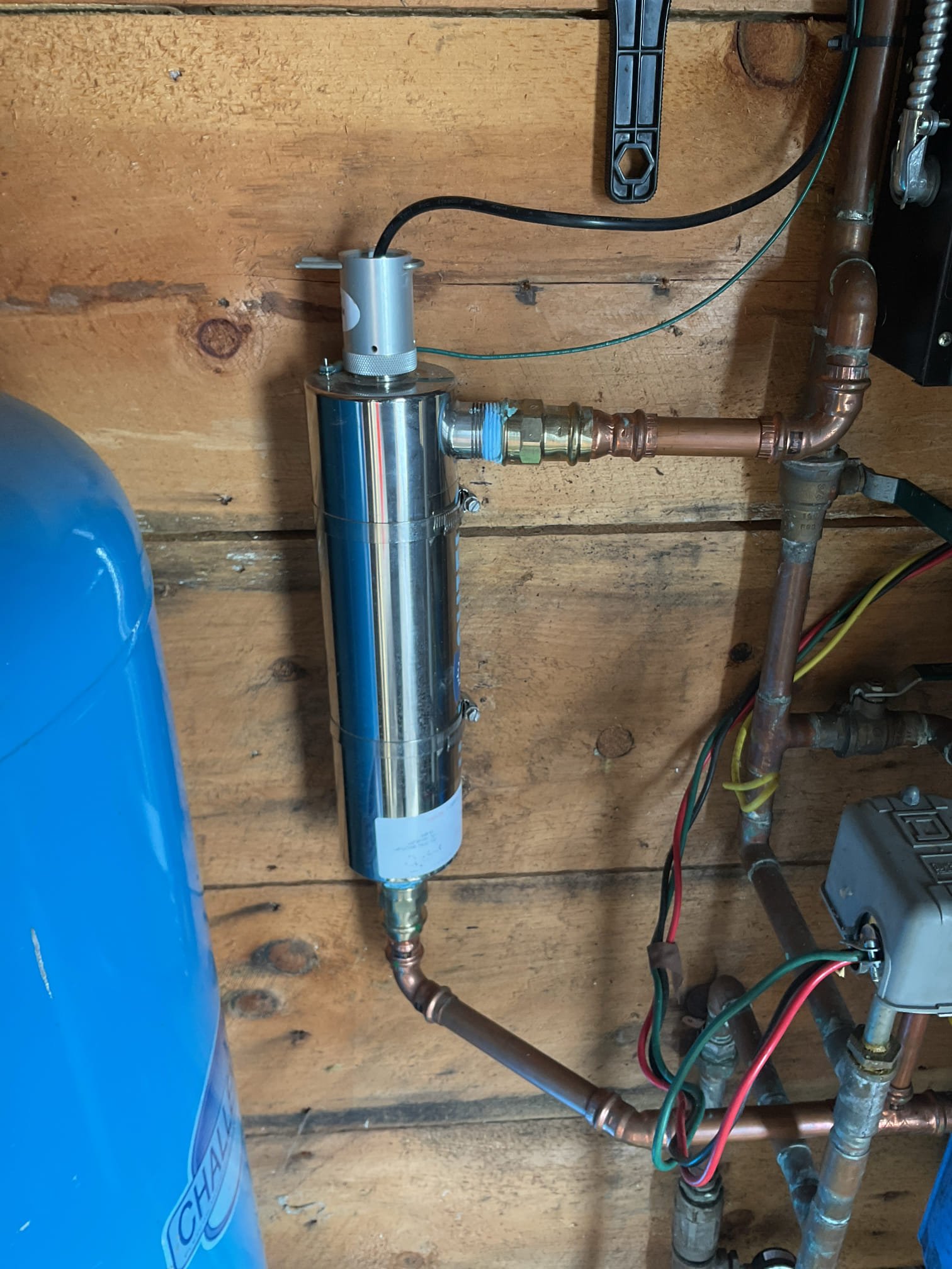 Upon arrival customer needed two UV light bulbs replaced and two sediment filters replaced and a ball valve and boiler drain installed at the barn to give the Lancaster UV light greater serviceability. 

I started by removing and disposing of the Viqua UV bulb and sleeve and the 4x10 sediment filter. I replaced the bulb and 4x10 sediment filter with company supplied bulb and filter. I then cleaned and lubricated the o ring on the filter, remounted the cartridge housing, reset the control box of the bulb, flushed out the air pockets, and let the lamp heat up to ensure it was working properly. 

I then installed a boiler drain followed by a 3/4” ball valve after the barn apartment filter and UV light for improved serviceability. I then removed the UV bulb and 4x20 sediment filter and replaced them with the customer supplied bulb and filter in the utility room. The filter did not have an o ring at time of service. I applied lubricant to ensure seal, installed the bulb, reset the light, en