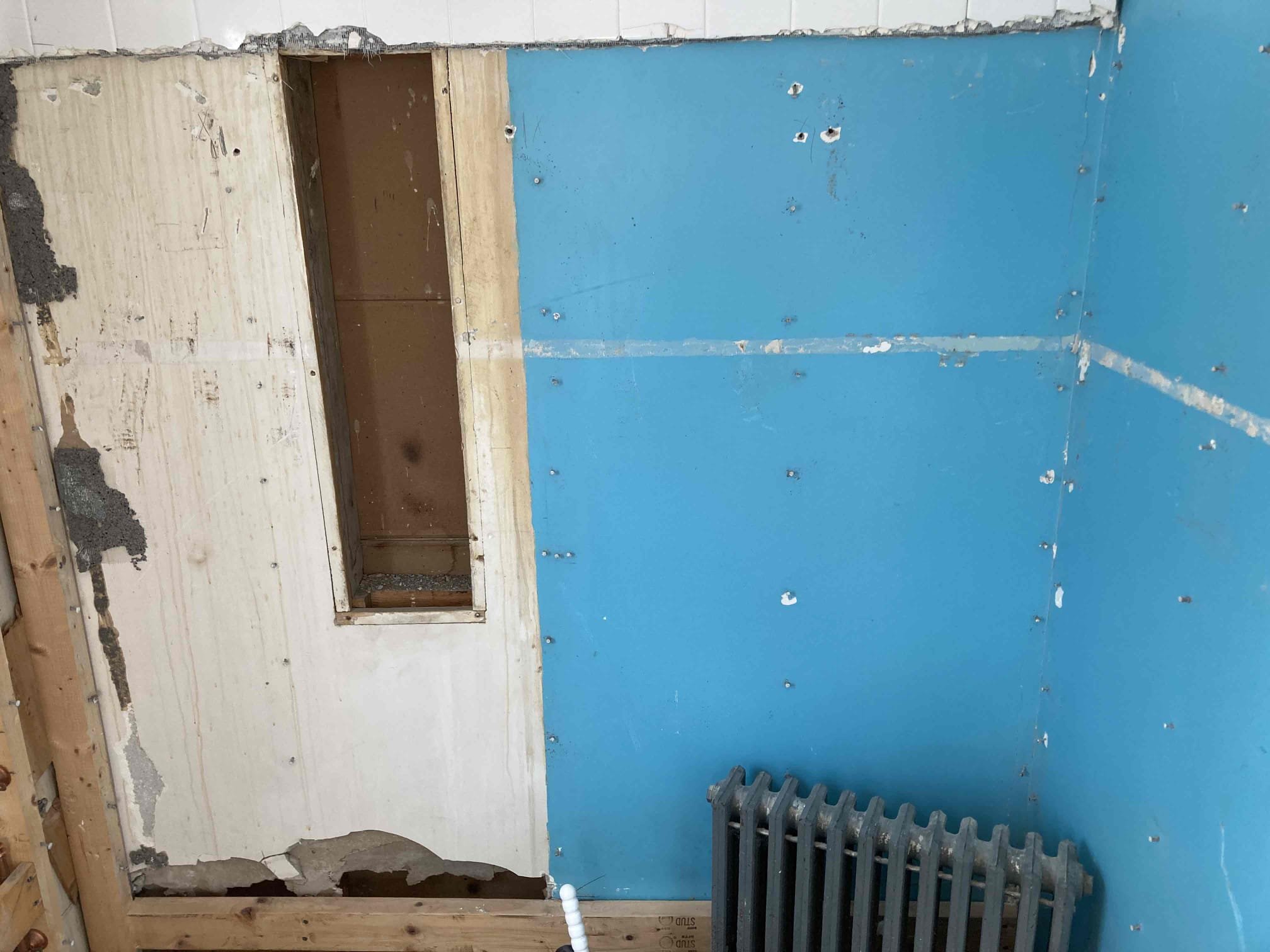 We found that the second-floor fixtures must be safely removed to prepare the space for remodeling. We propose disconnecting and capping the existing plumbing to prevent leaks and ensure a safe, efficient start to the renovation. This estimate includes demolition and removal of the cast iron tub.

1/9
Phase 1
-Installed two isolation ball valves in the basement ceiling assembly which controls the water for the second floor bathroom
-Removed the shutoff valves for the lavatory and toilet amd plugged the copper pipes
-Removed the lavatory s trap and plugged the drain pipe
-Demo amd removed the tile tub surround and cast iron tub
-Cut and removed the tub/shower valve
-Turned the valve off to the cast iron radiator and removed the radiator, stored in the area of the existing tub
-Turned the water back onto the house
-Will return to complete the second phase 