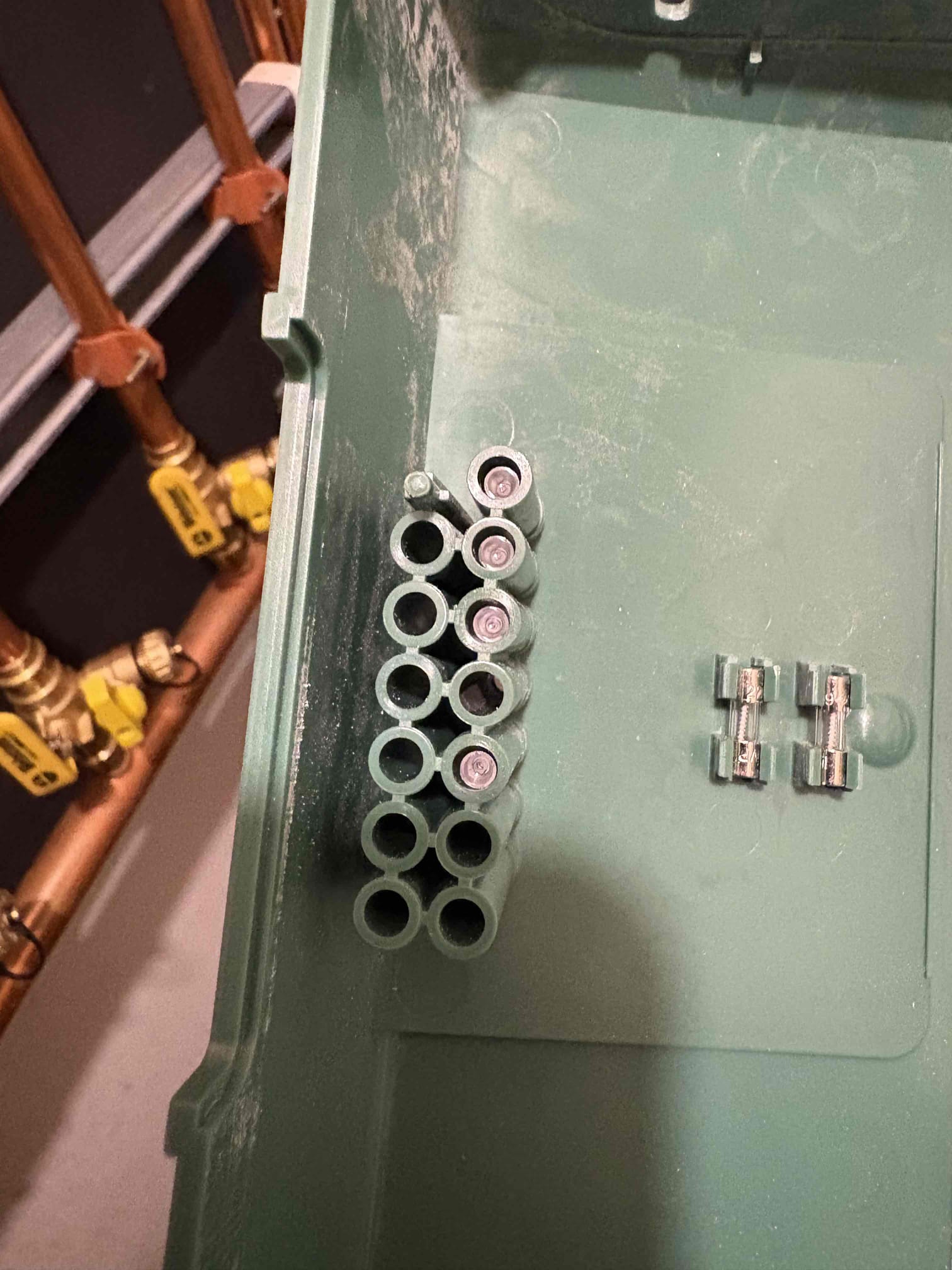 Responded to a no-heat complaint in the garage and the space above the garage. Upon arrival, confirmed a call for heat from the thermostat and observed that the return piping for zone 1 was cold. Purged the zone and verified there were no freeze conditions. Confirmed proper water circulation through the zone. Observed the circulator intermittently cycling on and off despite a constant call for heat. Verified proper voltage at the relay board and at the circulator. Determined that the electrical plug at the circulator was not fully secured. Reseated the connector and verified secure connections at all remaining circulators. The system is operating properly at this time.
