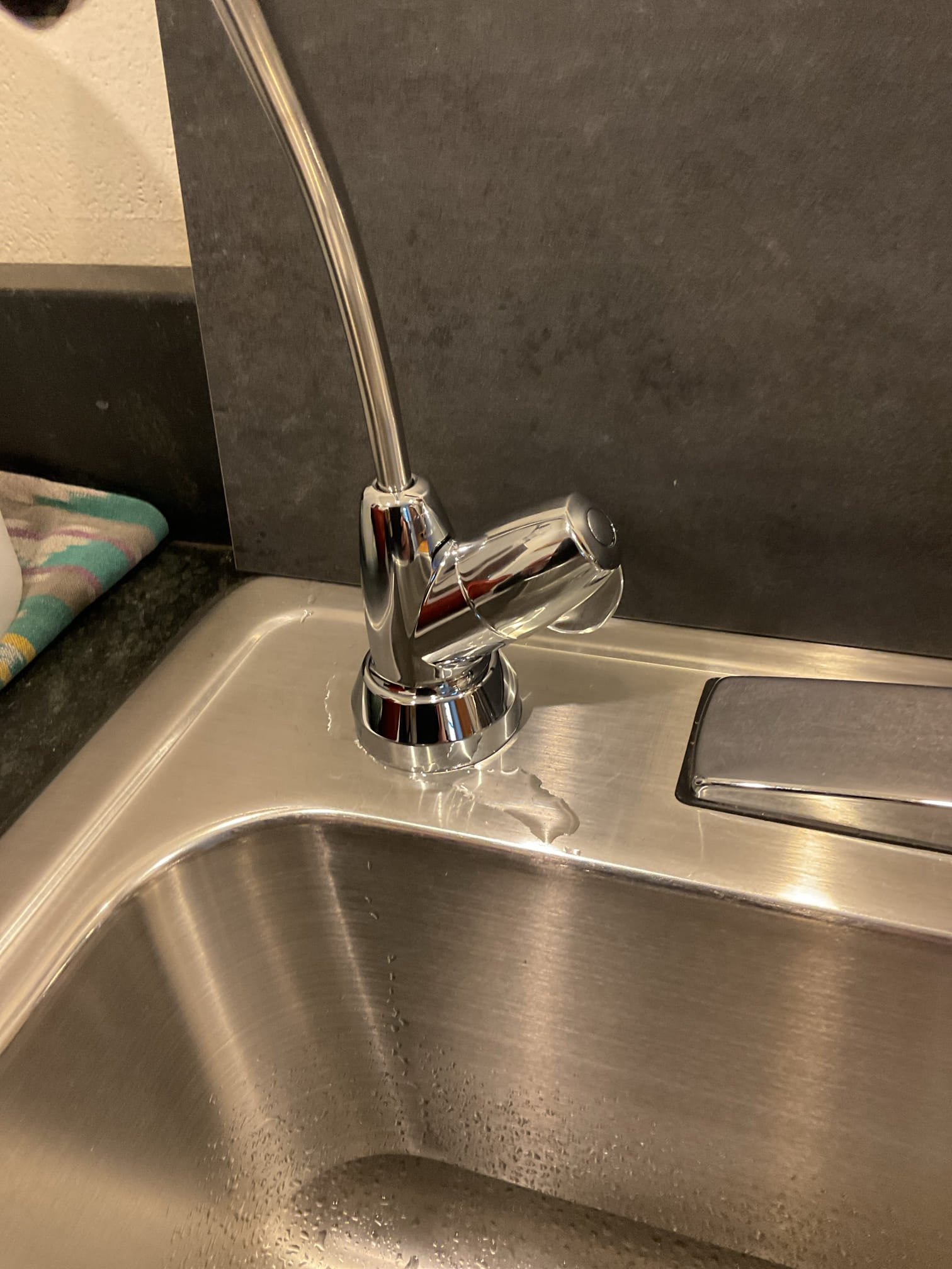 Upon arrival water was coming out of the air gap. I increased the size of the drain hole in the tailpiece to ensure proper flow to the drain. 

Everything is working well with no leaks present 