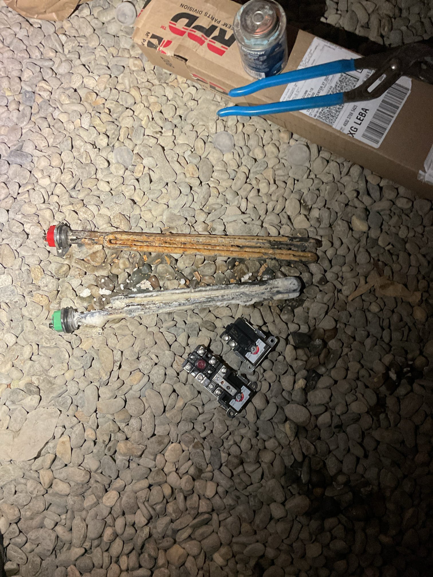 Arrived on site to replace elements in newly installed water heater. We verified power was turned off and removed both upper and lower elements and thermostats. The elements that were installed were heavily covered in calcium. We installed new thermostats and elements. 

We recommended to Ann that we have a plumber come out and take a look at the water treatment system as there may be something going on with it.

Warranty - no charge